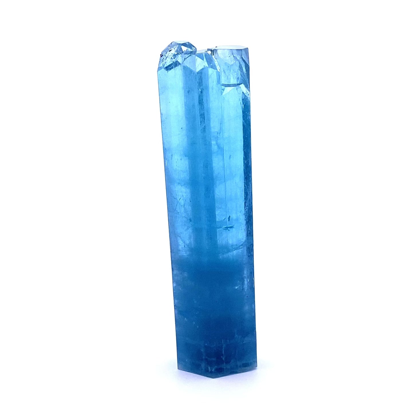 Aquamarine: Brilliant blue color with multiple terminations at the top sits in high contrast on white background, spinning on turntable. From Vietnam. All natural smooth, lustrous edges.