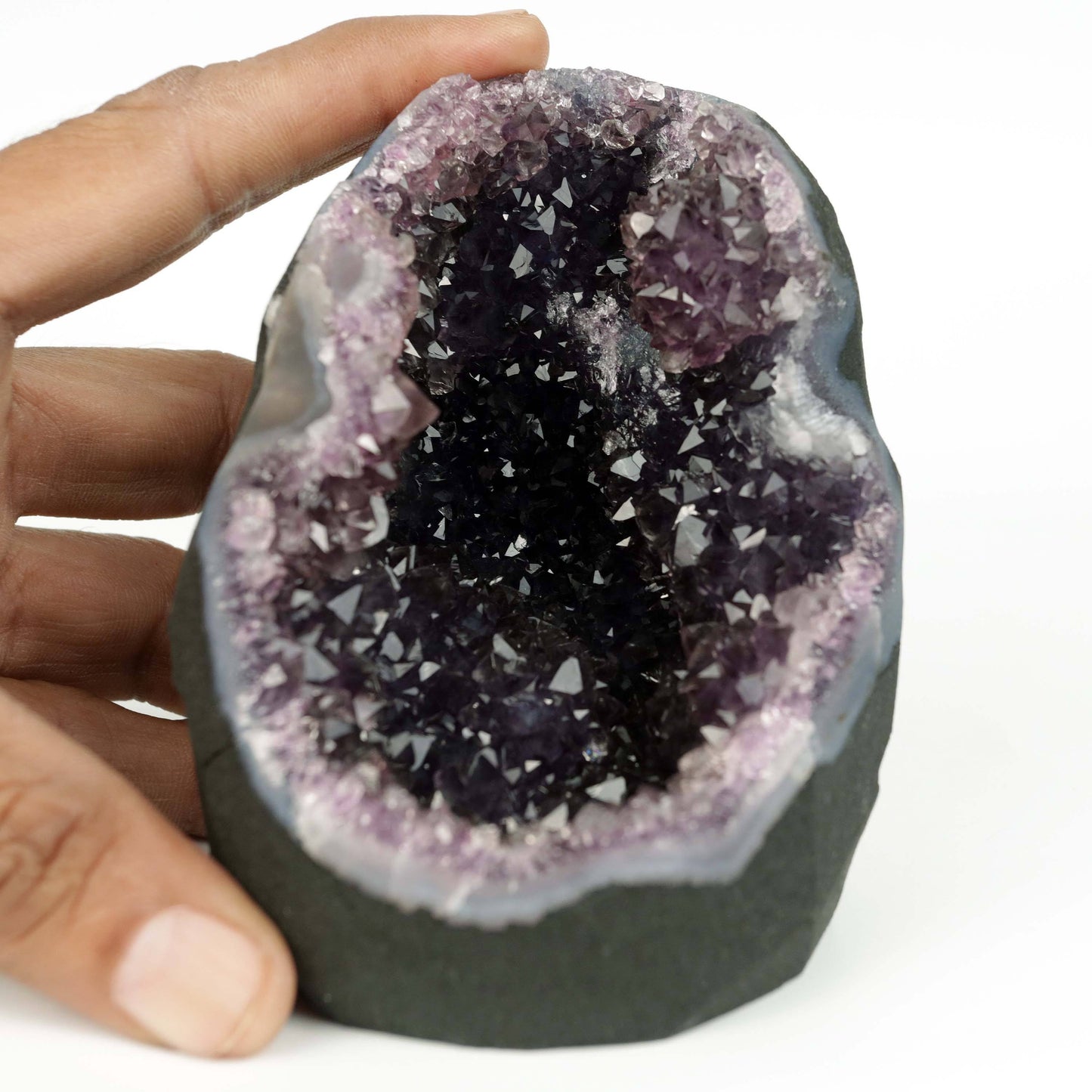 Amethyst Dark Purple Crystals Geode Natural Mineral Specimen # B 4645 https://www.superbminerals.us/products/amethyst-dark-purple-crystals-geode-natural-mineral-specimen-b-4645 Features: A Geode encrusted with beautiful, transparent Amethyst Quartz crystals in deep purple. Amethyst's vivid purple is unlike anything else on the market, and this piece is no exception. Aesthetic, with excellent colour and shine, and at a great price. It is in good shape. Primary Mineral(s): Amethyst
