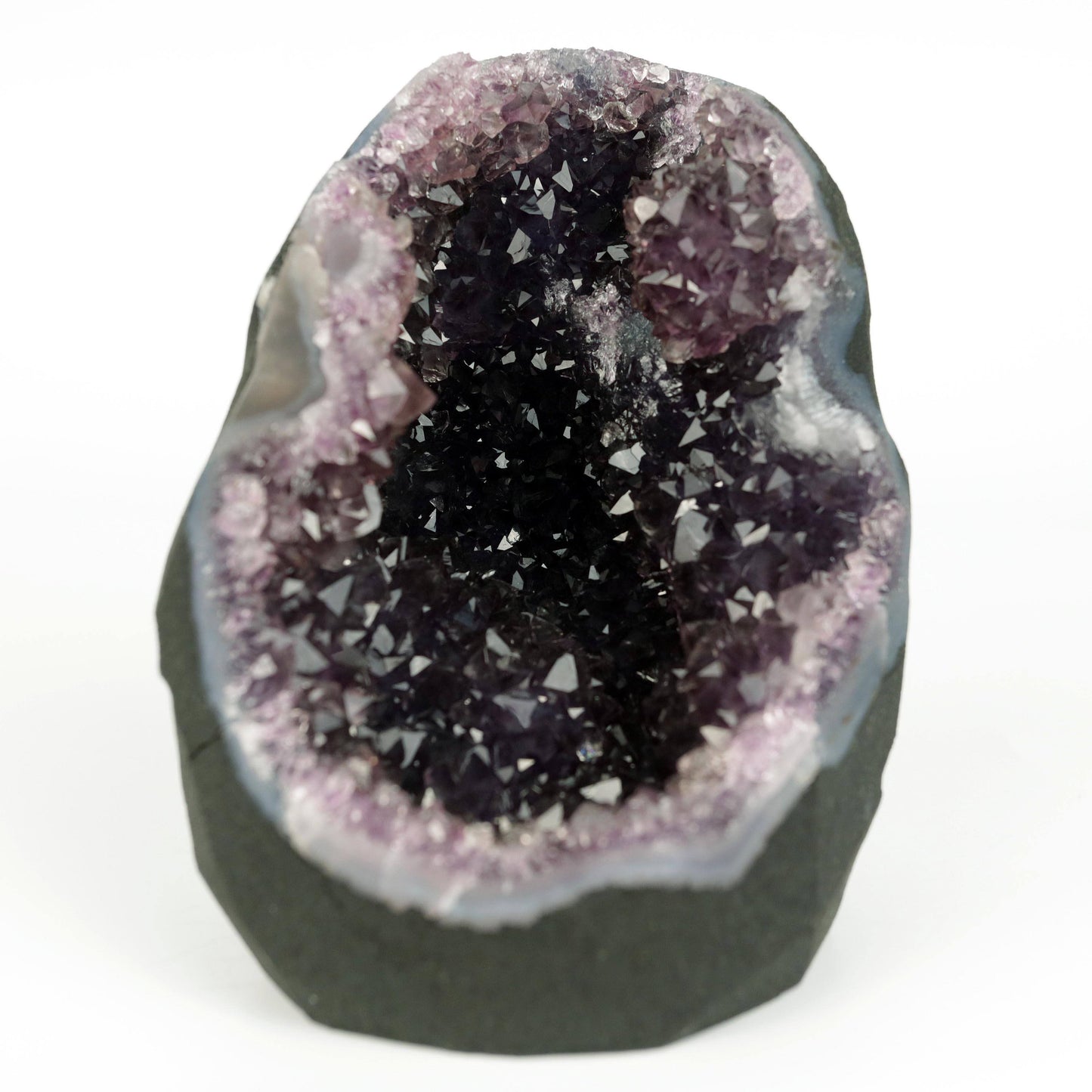 Amethyst Dark Purple Crystals Geode Natural Mineral Specimen # B 4645 https://www.superbminerals.us/products/amethyst-dark-purple-crystals-geode-natural-mineral-specimen-b-4645 Features: A Geode encrusted with beautiful, transparent Amethyst Quartz crystals in deep purple. Amethyst's vivid purple is unlike anything else on the market, and this piece is no exception. Aesthetic, with excellent colour and shine, and at a great price. It is in good shape. Primary Mineral(s): Amethyst