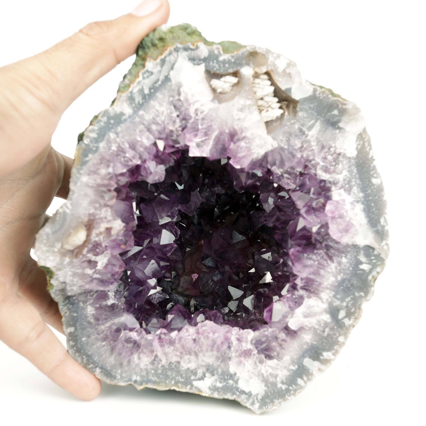 Amethyst Dark Purple Crystals Geode Natural Mineral Specimen # B 4648  https://www.superbminerals.us/products/amethyst-dark-purple-crystals-geode-natural-mineral-specimen-b-4648  Features: A Geode encrusted with beautiful, transparent Amethyst Quartz crystals in deep purple. Amethyst's vivid purple is unlike anything else on the market, and this piece is no exception. Aesthetic, with excellent colour and shine, and at a great price. It is in good shape. Primary Mineral(s): Amethys