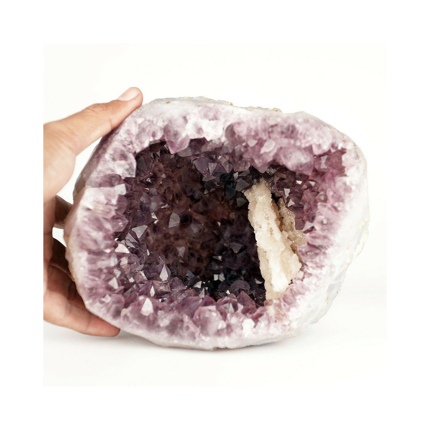 Amethyst purple geod formation with Calcite Natural Mineral Specimen # b3669 An Amethyst Quartz Geode from India! The Amethyst is lustrous and a unique purple color on a colorless Chalcedony. There is banding clearly present on the opening edge, and there is a unique thin reddish-brown streak around the inside of the geode due to a self-healed fracture on the outside of the geode.