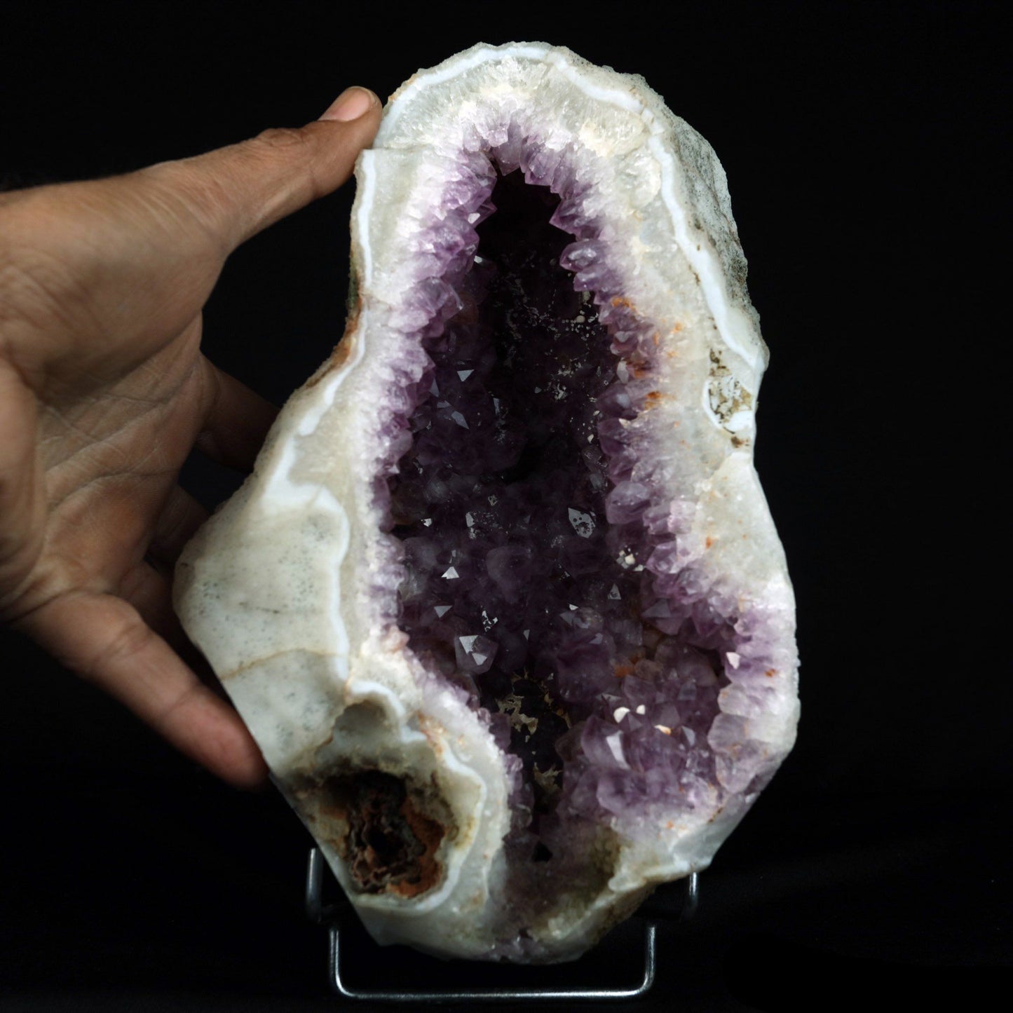 Amethyst Sparkling Geode (repaired) Natural Mineral Specimen # B 4922 https://www.superbminerals.us/products/amethyst-sparkling-geode-repaired-natural-mineral-specimen-b-4922 Features: A Geode decorated with rich purple Amethyst Quartz crystals that are translucent. The rich purple of amethyst is unlike any other gemstone, and this piece is no exception. Aesthetic, with wonderful colour and sheen, and at an affordable price. It's in good condition. Primary Mineral(s): Amethyst