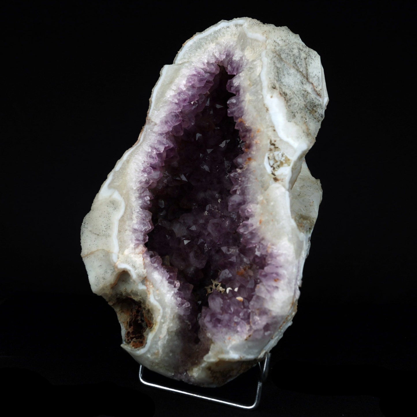 Amethyst Sparkling Geode (repaired) Natural Mineral Specimen # B 4922 https://www.superbminerals.us/products/amethyst-sparkling-geode-repaired-natural-mineral-specimen-b-4922 Features: A Geode decorated with rich purple Amethyst Quartz crystals that are translucent. The rich purple of amethyst is unlike any other gemstone, and this piece is no exception. Aesthetic, with wonderful colour and sheen, and at an affordable price. It's in good condition. Primary Mineral(s): Amethyst
