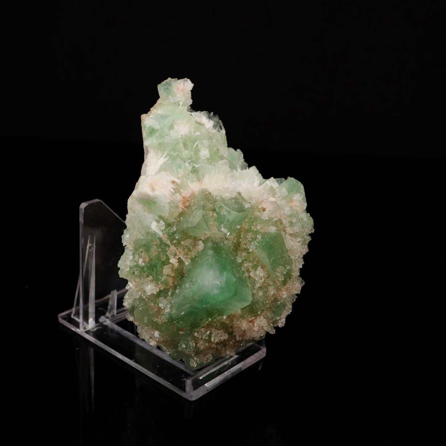 Apophyllite Cubes green Natural Mineral Specimen # B 5549 https://www.superbminerals.us/products/apophyllite-cubes-green-natural-mineral-specimen-b-5549 Features:Primary Mineral(s): ApophylliteSecondary Mineral(s): N/AMatrix: N/ASize : 3 Inch x 4 InchWeight : 271 GmsLocality: Nashik , Maharashtra, India Fluorapophyllite crystals with peach Stilbite crystals on minor matrix from Nashik, excellent grade, sharp, glossy and doubly terminated.