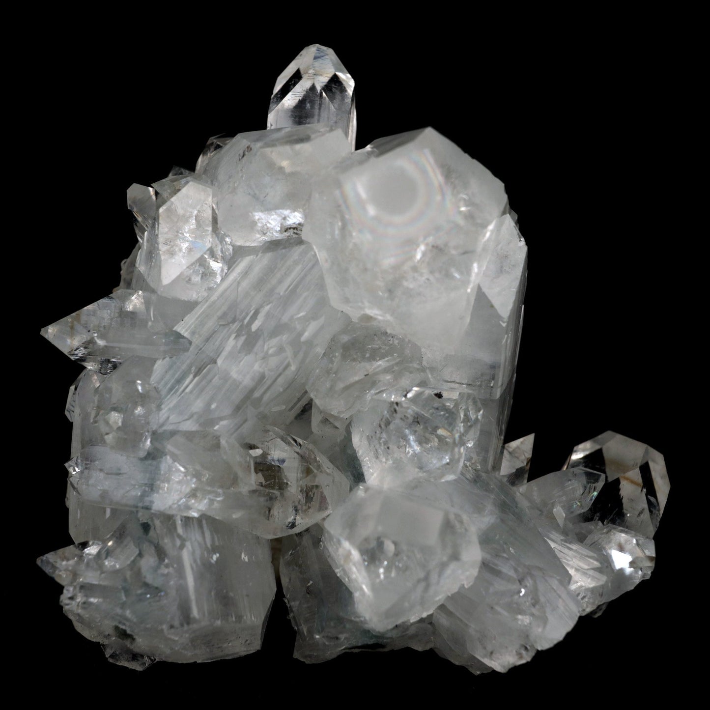 Apophyllite Terminated Sparkling Crystal Natural Mineral Specimen # B … https://www.superbminerals.us/products/apophyllite-terminated-sparkling-crystal-natural-mineral-specimen-b-3928 FeaturesThis is a beautifully balanced and aesthetic specimen of water clear, transparent Apophyllite. Positioned perfectly in the center of a mass of lustrous Apophyllite crystals, is a large, perfect pyramidal Apophyllite crystal. This piece really stands out, is a great show piece, and has no damage