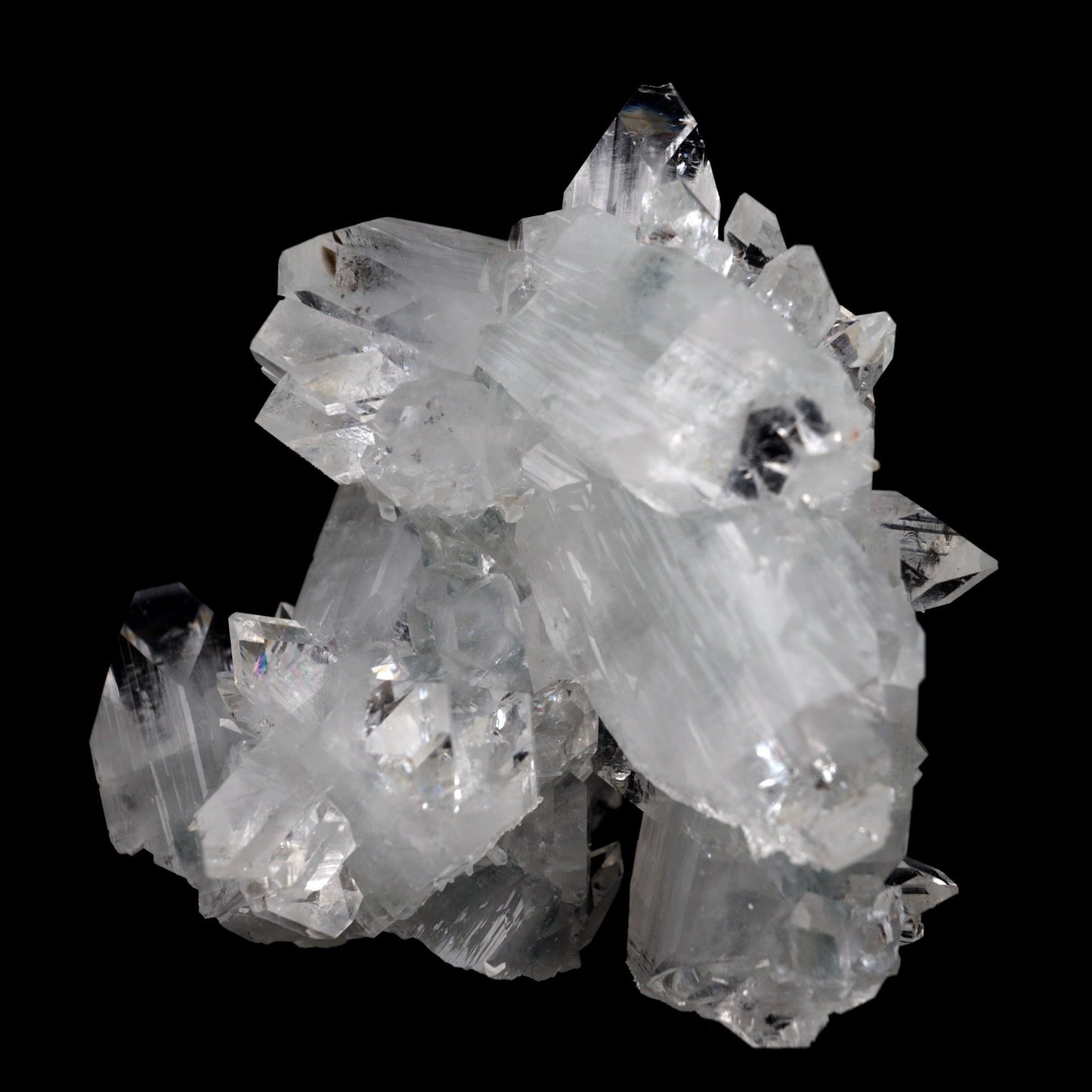 Apophyllite Terminated Sparkling Crystal Natural Mineral Specimen # B … https://www.superbminerals.us/products/apophyllite-terminated-sparkling-crystal-natural-mineral-specimen-b-3928 FeaturesThis is a beautifully balanced and aesthetic specimen of water clear, transparent Apophyllite. Positioned perfectly in the center of a mass of lustrous Apophyllite crystals, is a large, perfect pyramidal Apophyllite crystal. This piece really stands out, is a great show piece, and has no damage