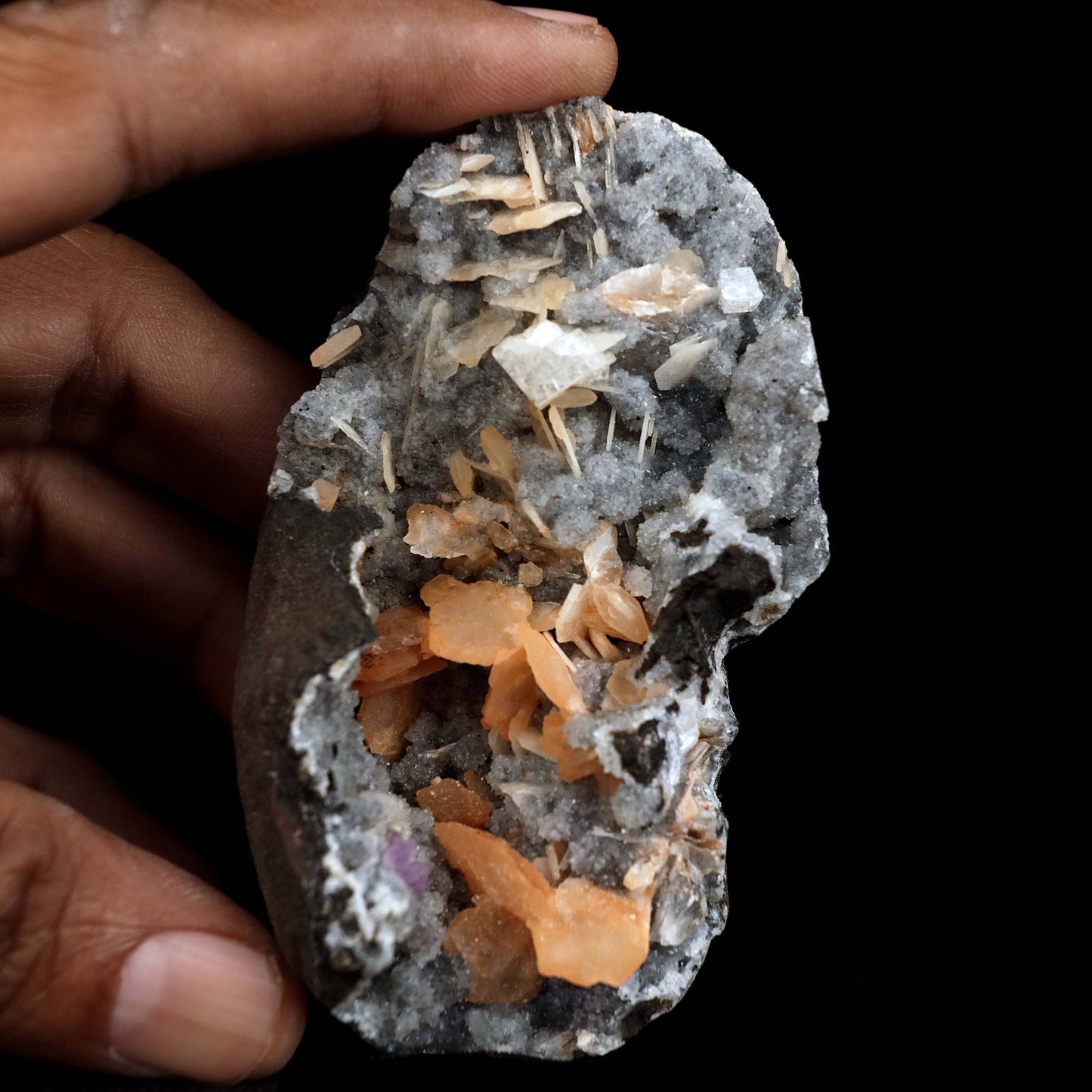 Barite on Chalcedony Natural Mineral Specimen # B 4548  https://www.superbminerals.us/products/barite-on-chalcedony-natural-mineral-specimen-b-4548  Features:An orange to light pink barite crystal petal-like crystals adorn this stunning, transparent specimen. Both the horizontal and vertical crystals are transparent and have a smooth lustre. In person, the aesthetics are so much more subtle