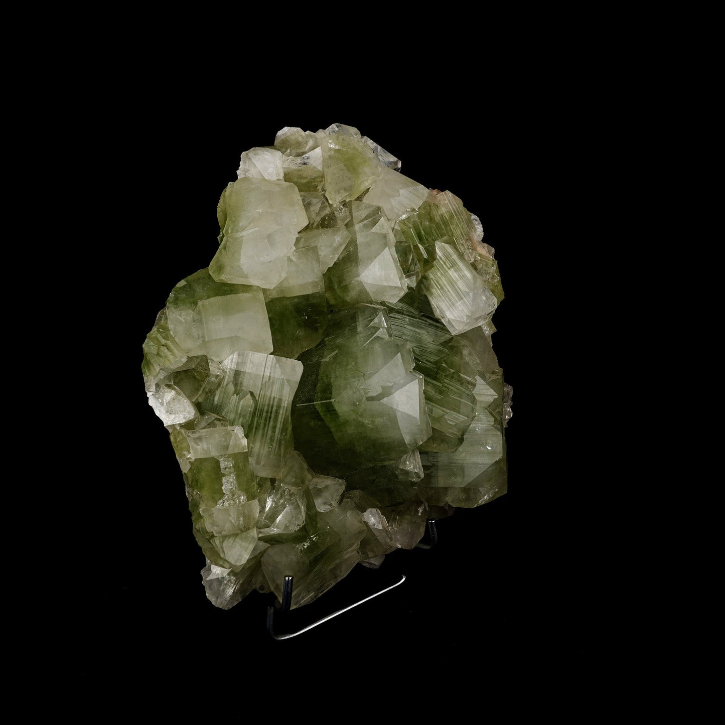 Bi- Color Apophyllite Pseudo Crystals Natural Mineral Specimen # B 52… https://www.superbminerals.us/products/bi-color-apophyllite-pseudo-crystals-natural-mineral-specimen-b-5225 Features: This outstanding huge mounded combination from Jalgaon's recent findings is highlighted by a magnificent color-zoned apophyllite crystal bordered by lesser crystals of the same type. The rich mint-green centres and colourless terminations on the glassy, translucent tetragonal apophyllites
