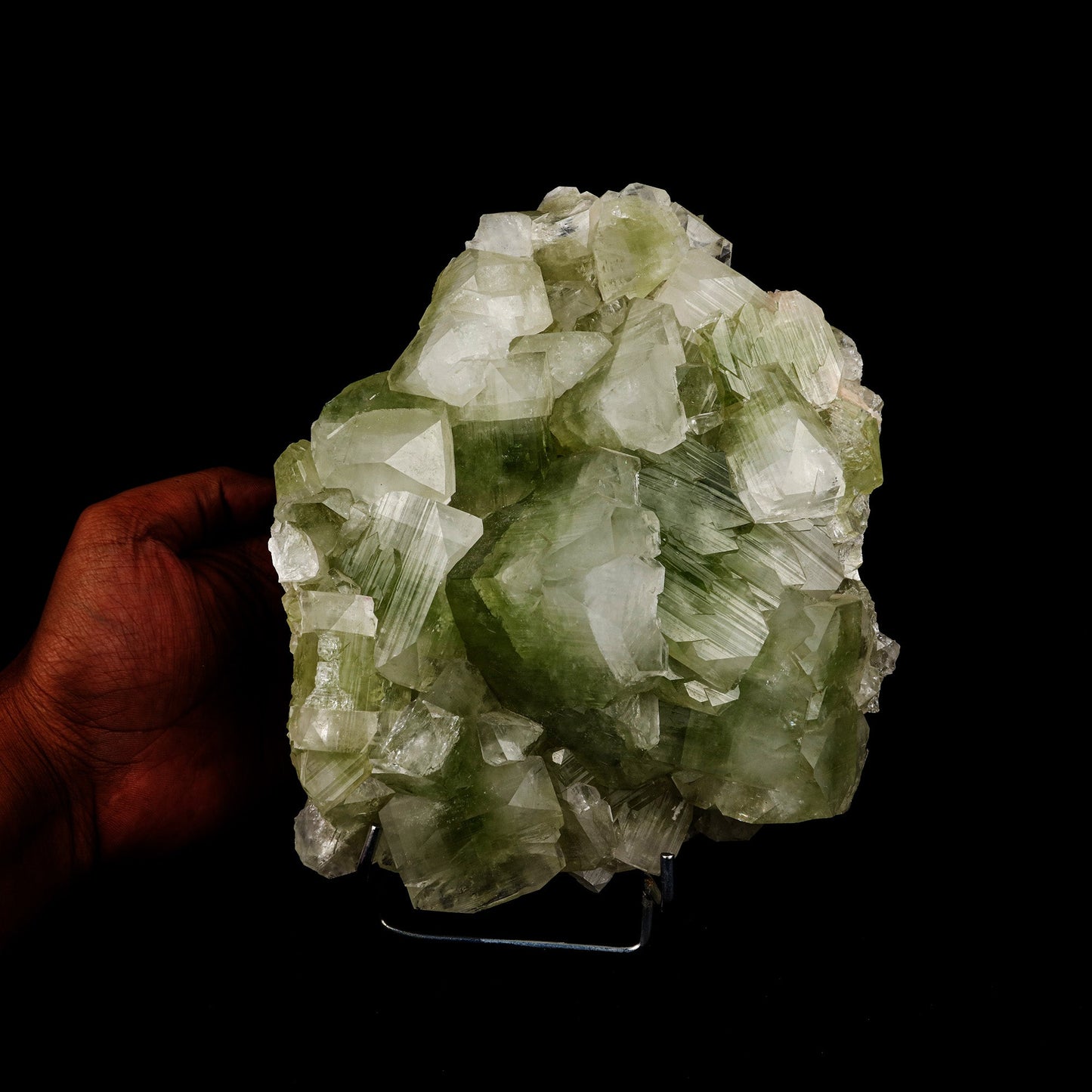 Bi- Color Apophyllite Pseudo Crystals Natural Mineral Specimen # B 52… https://www.superbminerals.us/products/bi-color-apophyllite-pseudo-crystals-natural-mineral-specimen-b-5225 Features: This outstanding huge mounded combination from Jalgaon's recent findings is highlighted by a magnificent color-zoned apophyllite crystal bordered by lesser crystals of the same type. The rich mint-green centres and colourless terminations on the glassy, translucent tetragonal apophyllites