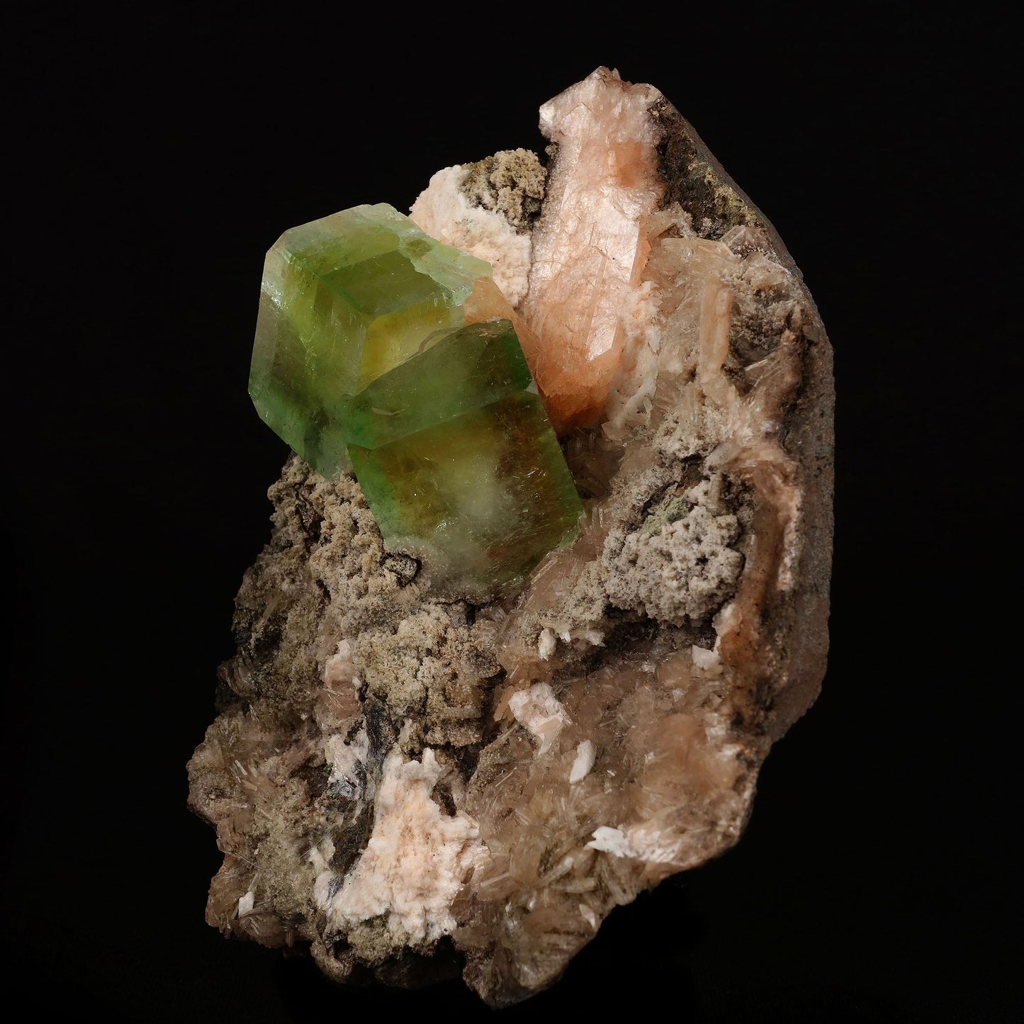 Bi-colored Fluorapophyllite and Stilbite Natural Mineral Specimen # B… https://www.superbminerals.us/products/bi-colored-fluorapophyllite-and-stilbite-natural-mineral-specimen-b-5084 Features: A striking, large blocky, color-zoned apophyllite crystal aesthetically flanked by similar smaller crystals dramatically highlights this impressive large mounded combination from recent finds in Jalgaon. The glassy, translucent tetragonal apophyllites have rich mint-green centers and colorless terminations