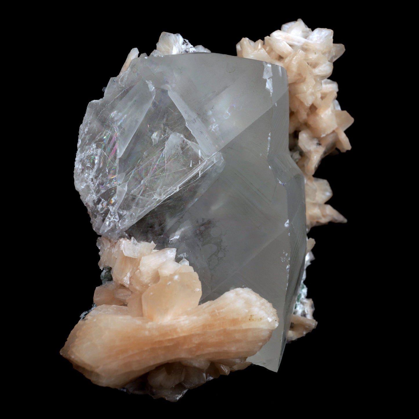 Calcite with Stilbite Natural Mineral Specimen (Repaired) # B 3904 https://www.superbminerals.us/products/calcite-with-stilbite-natural-mineral-specimen-repaired-b-3904 FeaturesA huge, delightful smooth white to smoky rhombohedral Calcite crystal, anxious, with crossing Stilbite crystals on a network of snow-white microcrystalline Quartz, with minor Apophyllite.