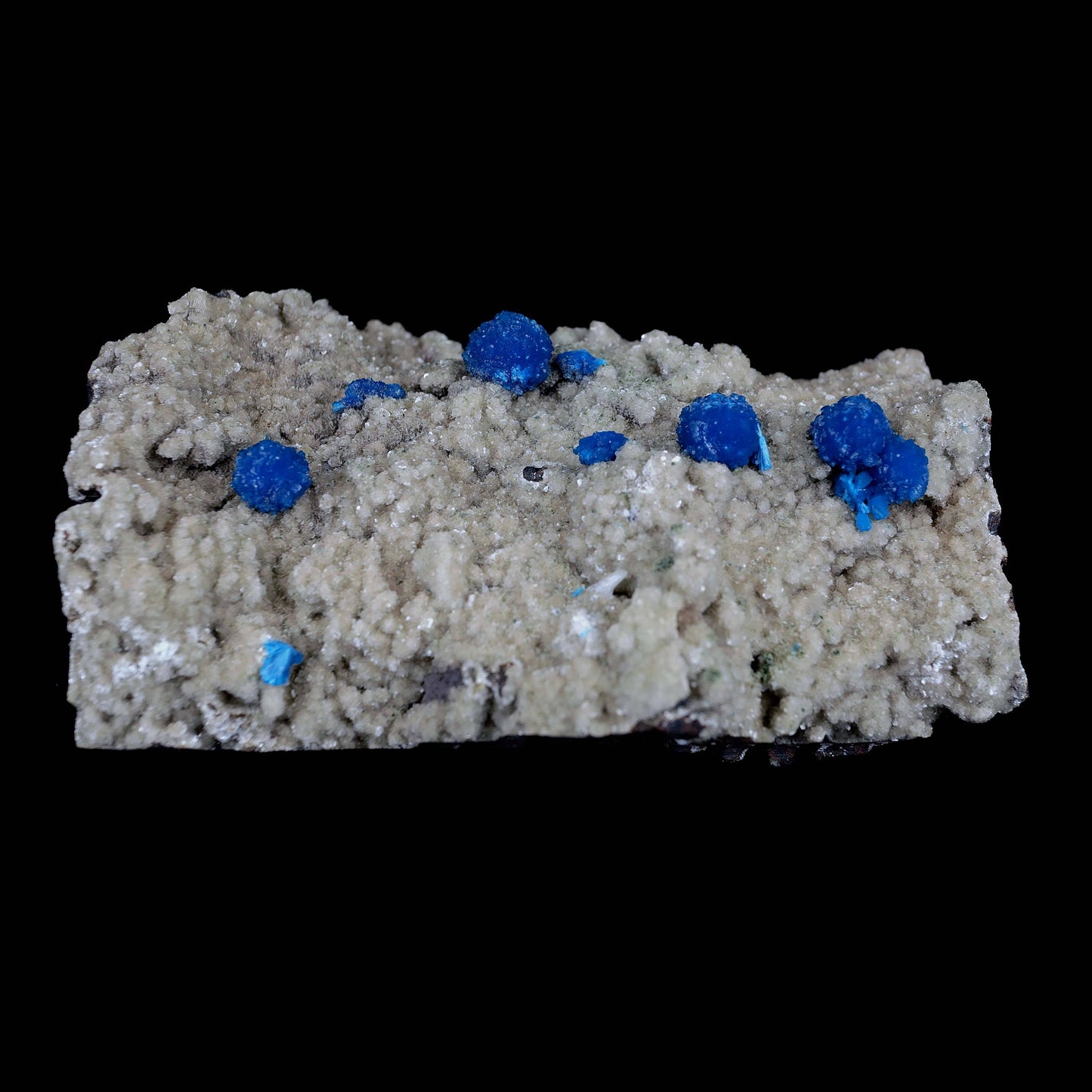 Cavansite Blue Puff Balls on Heuladnite Natural Mineral Specimen # B 4…  https://www.superbminerals.us/products/cavansite-blue-puff-balls-on-heuladnite-natural-mineral-specimen-b-4013  Features These are gorgeous, deep blue Cavansite crystal aggregations on a micro Stilbite crystal encrusted matrix, collected from the Wagholi Quarry in the Pune district of India. Cavansite tends to form deep blue crystal aggregates, generally in the form of balls, up to a couple centimeters in size. 