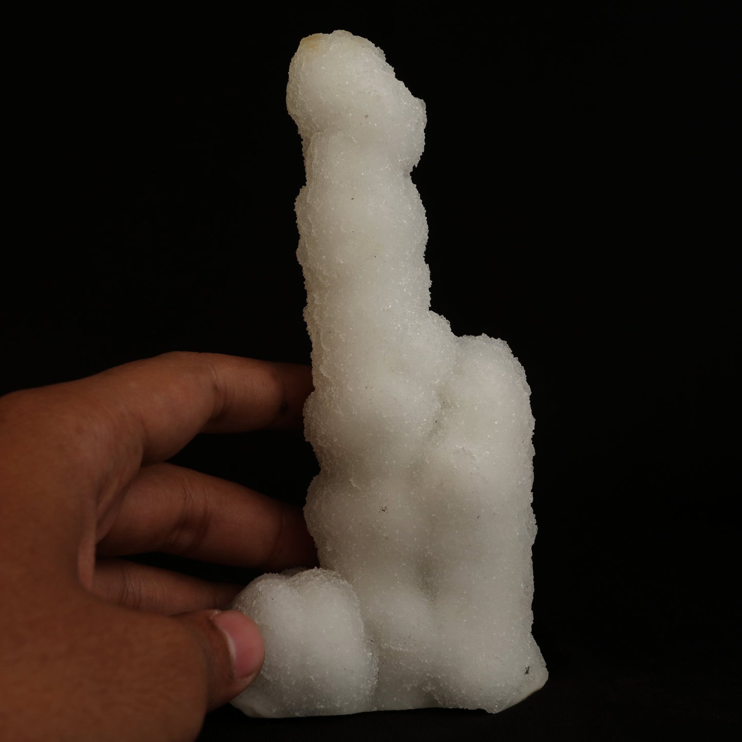 A Chalcedony stalactite that is colourless, dazzling, and translucent, ascending from a Chalcedony plate (or as it was in its original location, descending down . . . ). A lovely and natural formation — a wonderful aesthetic object in superb condition.