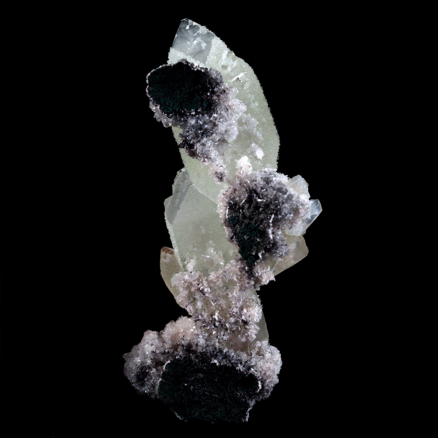 Doubly Terminated Fluro Apophyllite On Chalcedony Natural Mineral Spec… https://www.superbminerals.us/products/doubly-terminated-fluro-apophyllite-on-chalcedony-natural-mineral-specimen-b-4429 Features: Fantastic two toned, very glassy tetragonal apophyllite crystals with remarkable water-clear, gem, highly modified pinacoidal terminations around translucent bodies form a beautiful architectural stalactite from Jalgaon. The crowning crystal has a length of 5.5 cm.The silica-rich precipitated fluids