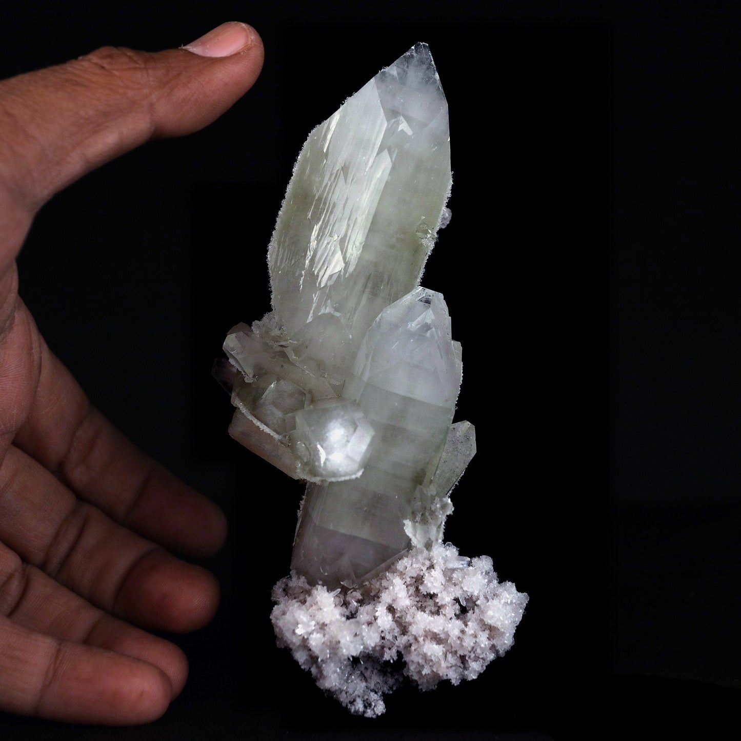 Doubly Terminated Fluro Apophyllite On Chalcedony Natural Mineral Spec… https://www.superbminerals.us/products/doubly-terminated-fluro-apophyllite-on-chalcedony-natural-mineral-specimen-b-4429 Features: Fantastic two toned, very glassy tetragonal apophyllite crystals with remarkable water-clear, gem, highly modified pinacoidal terminations around translucent bodies form a beautiful architectural stalactite from Jalgaon. The crowning crystal has a length of 5.5 cm.The silica-rich precipitated fluids