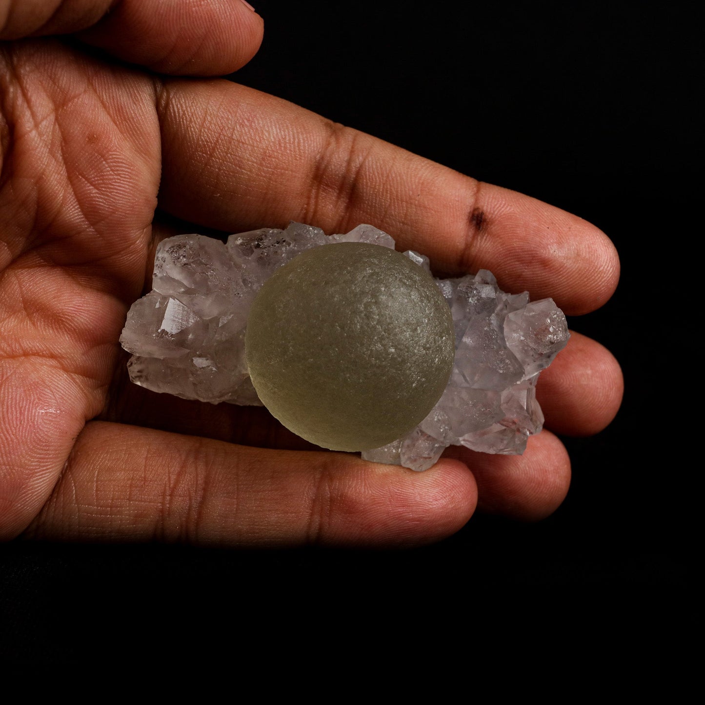 Fluorite Botridoal on MM Quartz Natural Mineral Specimen # B 5122 https://www.superbminerals.us/products/fluorite-botridoal-on-mm-quartz-natural-mineral-specimen-b-5122 Features: These golden botryoidal fluorites are unique and extremely attractive. This specimen features a a very gemmy, good sized, rich golden color, fluorite "sphere" on gemmy, colorless, stubby quartz crystal matrix. Primary Mineral(s): Fluorite Secondary Mineral(s): N/AMatrix: MM Quartz 2.5 Inch x 1.5 Inch