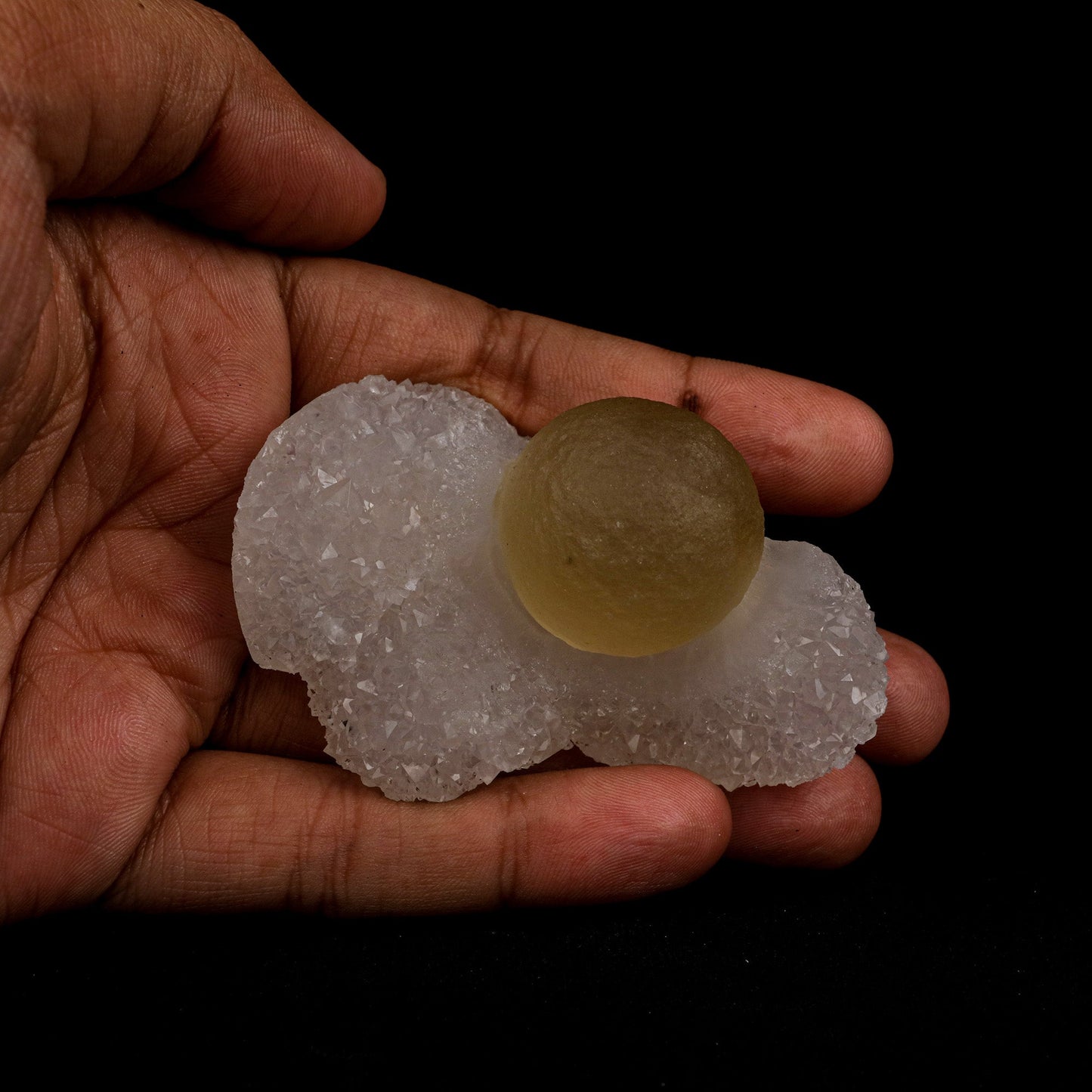 Fluorite Botridoal on MM Quartz Natural Mineral Specimen # B 5131 https://www.superbminerals.us/products/fluorite-botridoal-on-mm-quartz-natural-mineral-specimen-b-5131 Features: These golden botryoidal fluorites are unique and extremely attractive. This specimen features a a very gemmy, good sized, rich golden color, fluorite "sphere" on gemmy, colorless, stubby quartz crystal matrix. Primary Mineral(s): Fluorite