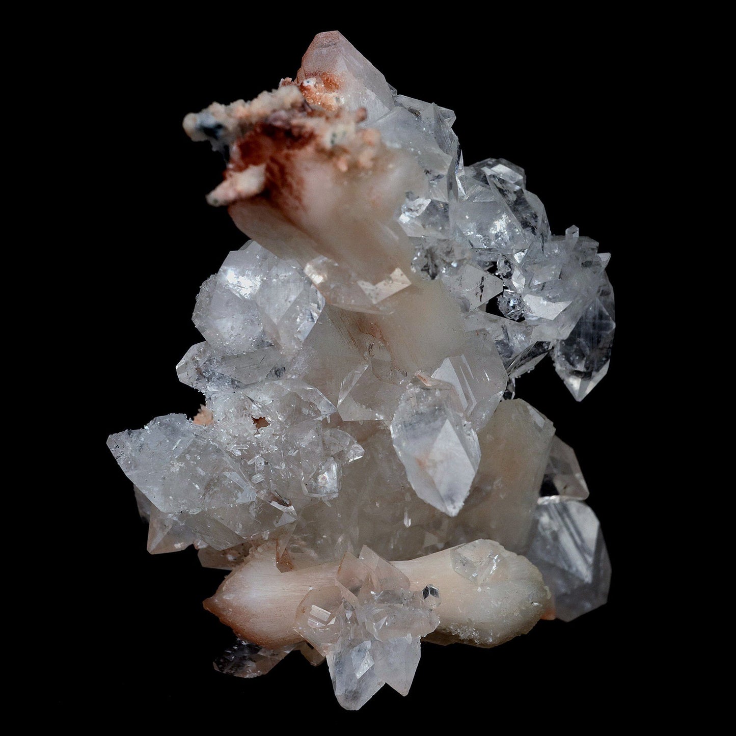 Gemmy Pointed Apophyllite with Stilbite Barbellate Formation # B 4167 https://www.superbminerals.us/products/gemmy-pointed-apophyllite-with-stilbite-barbellate-formation-b-4167 Features:Beautiful gem Apophyllite crystals decorated by Stilbite. It displays superb colorless up to bit reddish crystals. They have razor sharp octahedral shape. The crystals have glassy luster and pretty striations. The Apophyllite is from translucent to transparent and gemmy. Stilbite grow on the Apophyllite