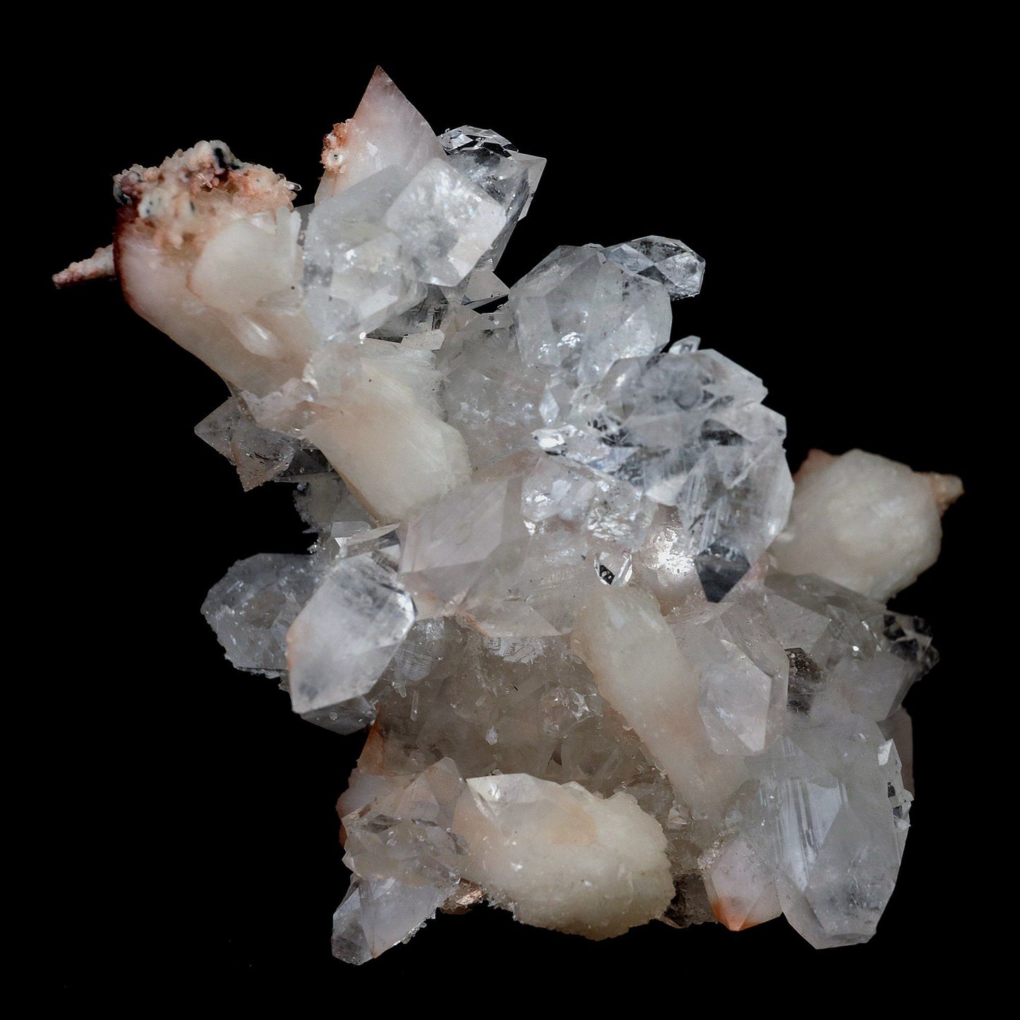 Gemmy Pointed Apophyllite with Stilbite Barbellate Formation # B 4167 https://www.superbminerals.us/products/gemmy-pointed-apophyllite-with-stilbite-barbellate-formation-b-4167 Features:Beautiful gem Apophyllite crystals decorated by Stilbite. It displays superb colorless up to bit reddish crystals. They have razor sharp octahedral shape. The crystals have glassy luster and pretty striations. The Apophyllite is from translucent to transparent and gemmy. Stilbite grow on the Apophyllite