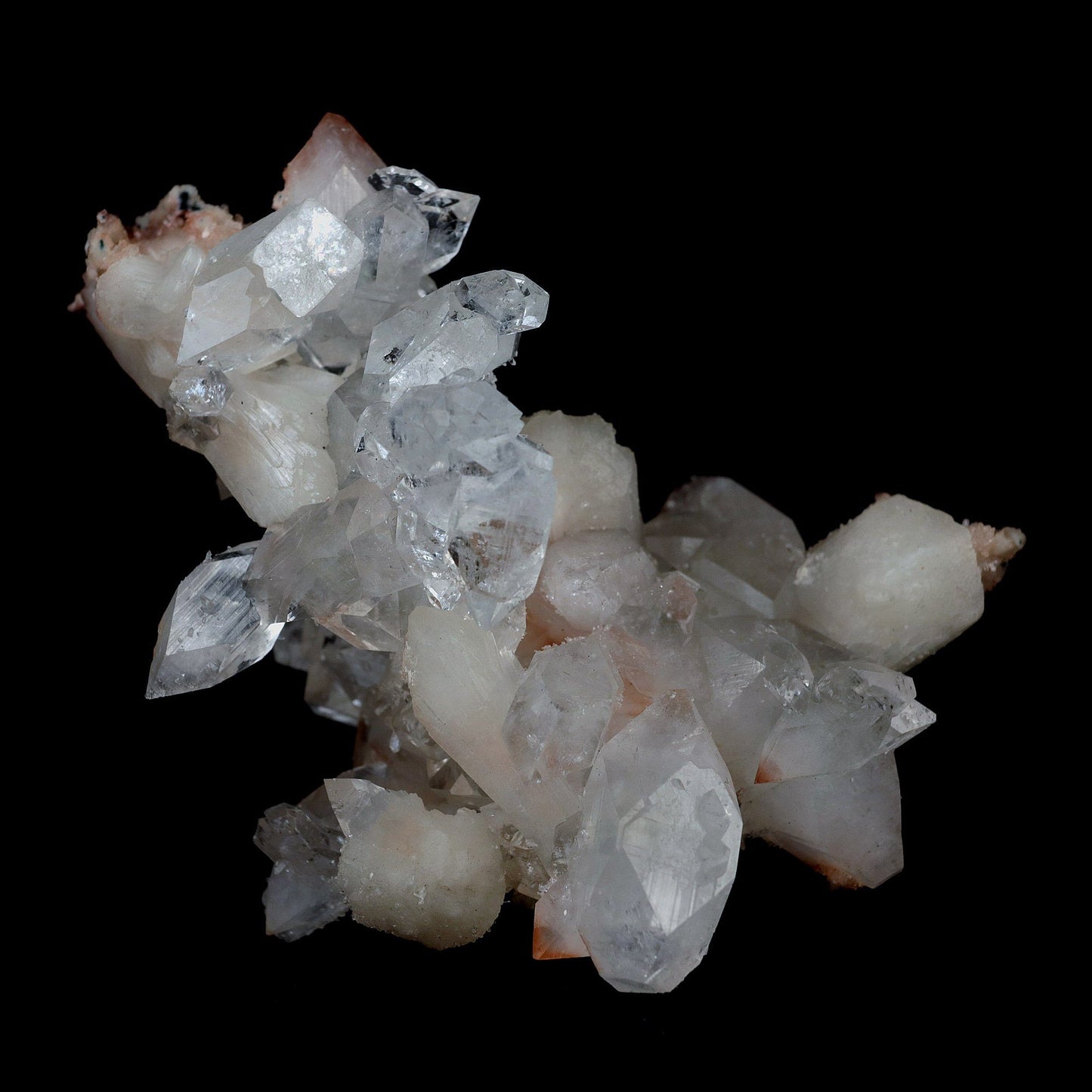 Gemmy Pointed Apophyllite with Stilbite Barbellate Formation # B 4167 https://www.superbminerals.us/products/gemmy-pointed-apophyllite-with-stilbite-barbellate-formation-b-4167 Features:Beautiful gem Apophyllite crystals decorated by Stilbite. It displays superb colorless up to bit reddish crystals. They have razor sharp octahedral shape. The crystals have glassy luster and pretty striations. The Apophyllite is from translucent to transparent and gemmy. Stilbite grow on the Apophyllite