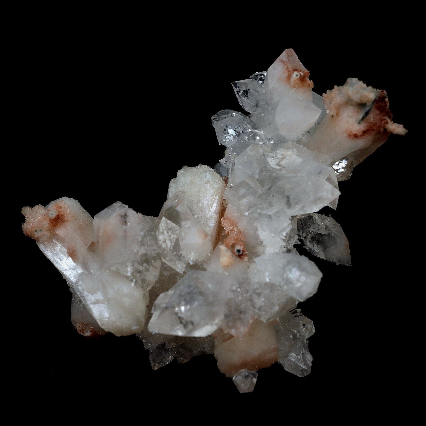 Gemmy Pointed Apophyllite with Stilbite Barbellate Formation # B 4167 https://www.superbminerals.us/products/gemmy-pointed-apophyllite-with-stilbite-barbellate-formation-b-4167 Features:Beautiful gem Apophyllite crystals decorated by Stilbite. It displays superb colorless up to bit reddish crystals. They have razor sharp octahedral shape. The crystals have glassy luster and pretty striations. The Apophyllite is from translucent to transparent and gemmy. Stilbite grow on the Apophyllite