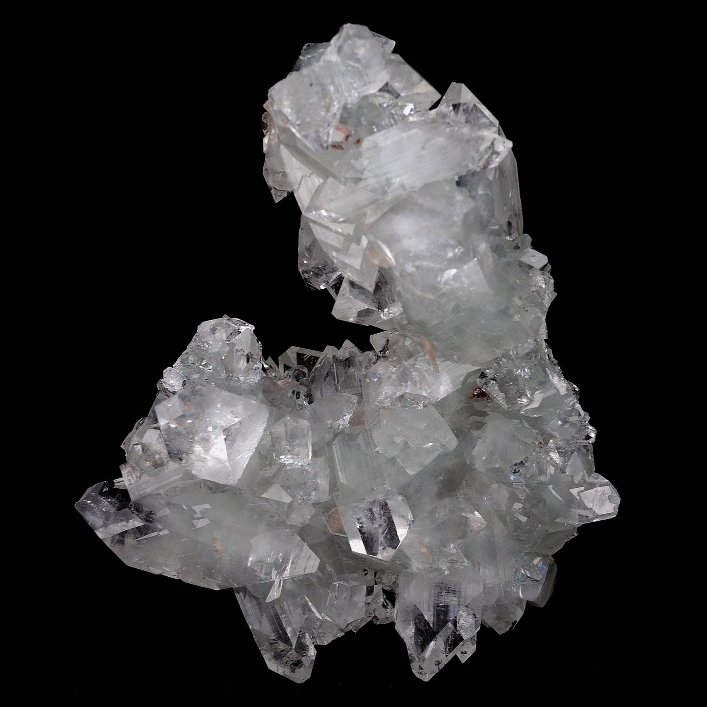 Gemmy Terminated Apophyllite Cluster Natural Mineral Specimen # B 4219 https://www.superbminerals.us/products/gemmy-terminated-apophyllite-cluster-natural-mineral-specimen-b-4219 Features:Fantastic doubly terminated colorless, very glassy, tetragonal apophyllite crystals with striking water-clear, gem, highly modified pinacoidal terminations around translucent bodies are dramatically stacked to form a stunning architectural stalactite from Jalgaon. The crowning crystal is bit long.