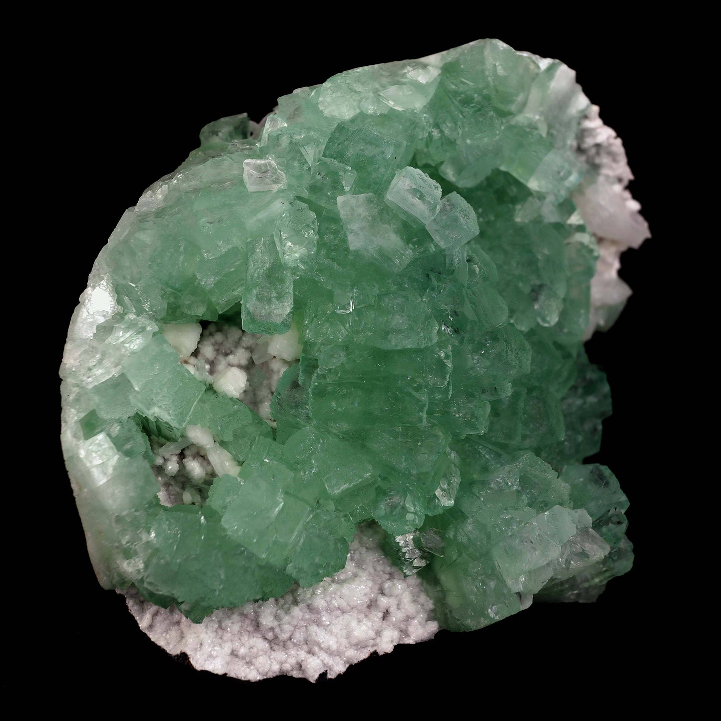 Green Apophyllite 3-D Crystals Big Cluster Natural Mineral Specimen #… https://www.superbminerals.us/products/green-apophyllite-3-d-crystals-big-cluster-natural-mineral-specimen-b-4626 Features: Striking, huge, and sculptural 3-dimensional matrix combination from an undisclosed Maharashtra State location. The item is dominated by two-toned, mint-green and off-white, glossy, transparent, blocky tetragonal apophyllite crystals with satin lustre faces.The apophyllites compliment each other nicely