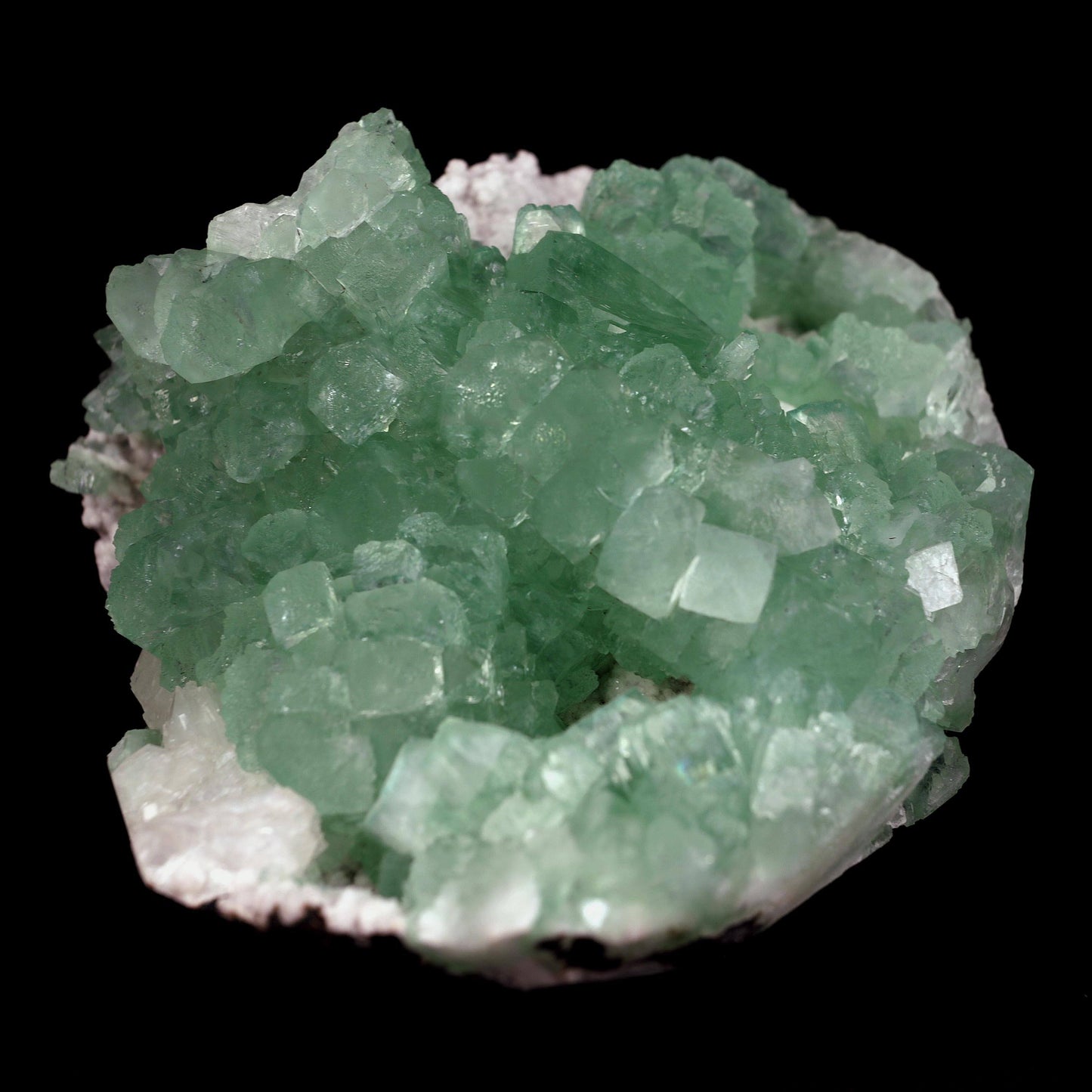 Green Apophyllite 3-D Crystals Big Cluster Natural Mineral Specimen #… https://www.superbminerals.us/products/green-apophyllite-3-d-crystals-big-cluster-natural-mineral-specimen-b-4626 Features: Striking, huge, and sculptural 3-dimensional matrix combination from an undisclosed Maharashtra State location. The item is dominated by two-toned, mint-green and off-white, glossy, transparent, blocky tetragonal apophyllite crystals with satin lustre faces.The apophyllites compliment each other nicely