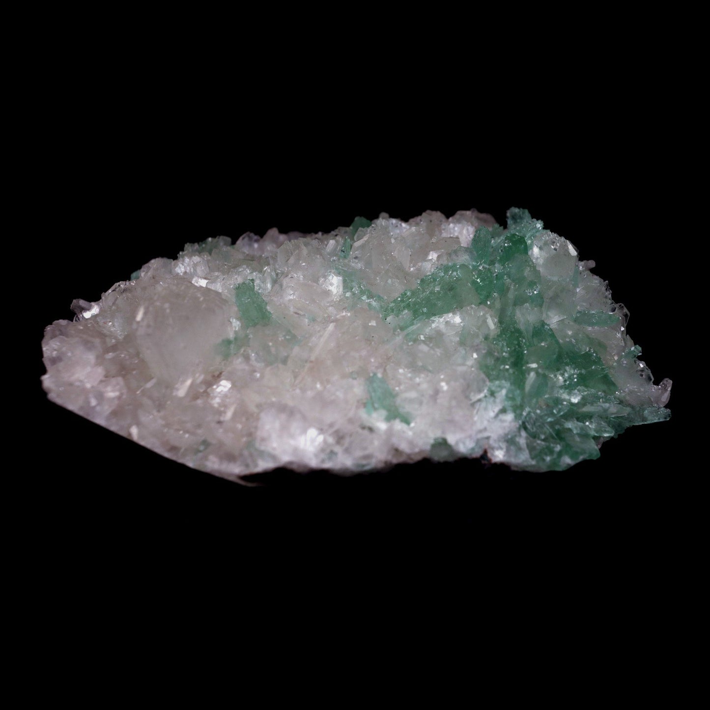 Green Apophyllite Crystals with Stilbite Big Cluster Natural Mineral S… https://www.superbminerals.us/products/green-apophyllite-crystals-with-stilbite-big-cluster-natural-mineral-specimen-b-4785 Features: Large basalt matrices coated in strikingly beautiful two-toned gemmy tetragonal apophyllite crystals have beautiful starbursts, sprays, and clusters of gemmy, creamy stilbite blades strewn throughout them. The rich mint-green bodies of the apophyllite crystals are terminated by colourless