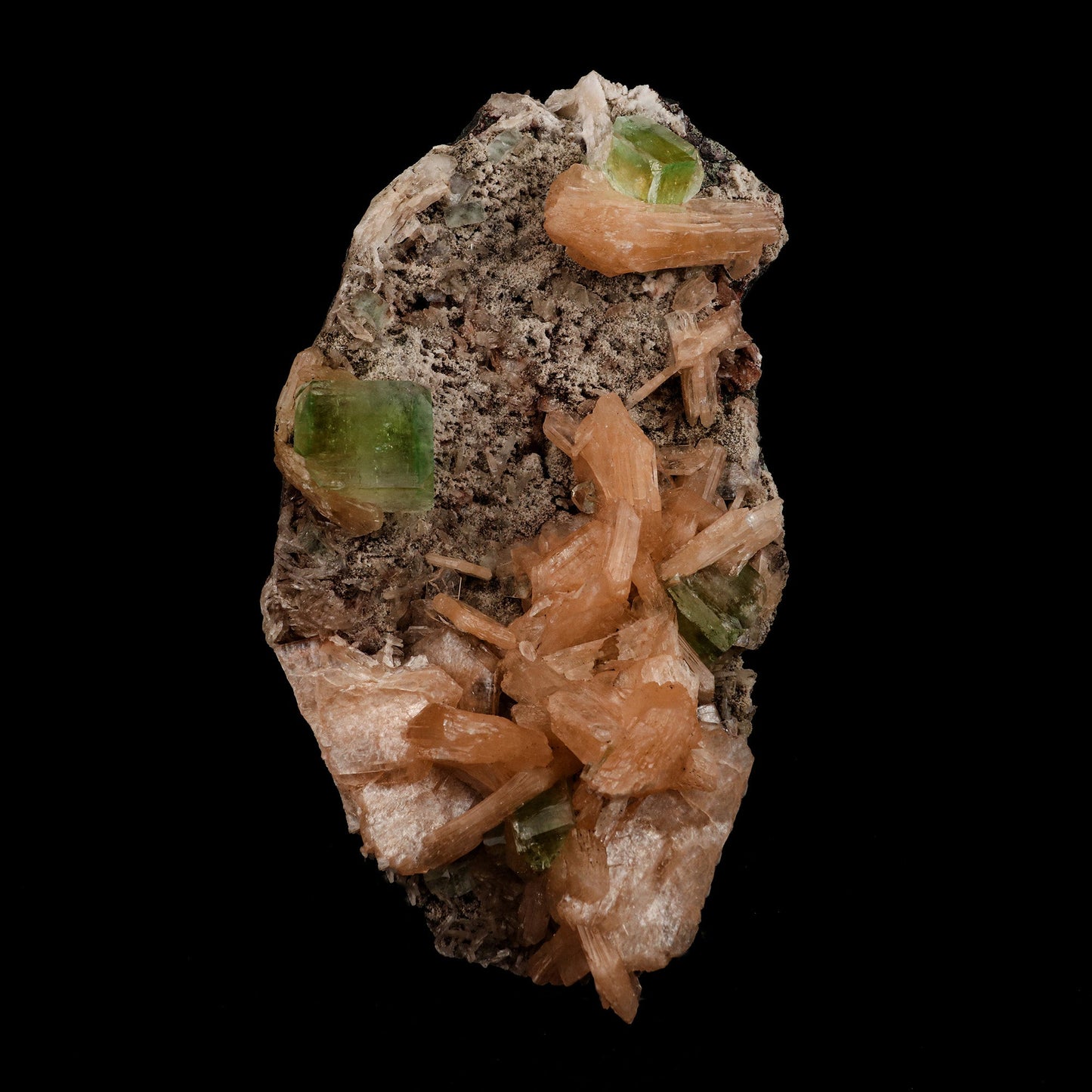 Green Apophyllite with Stilbite Natural Mineral Specimen # B 5090 https://www.superbminerals.us/products/green-apophyllite-with-stilbite-natural-mineral-specimen-b-5090 Features: A very aesthetic piece featuring a matrix densely coated with miniature, beige Stilbite crystals with a cluster of lustrous, larger light-beige Stilbite crystals at the base, all hosting a crown of transparent, mint-green Apophyllite pseudocubic (rectangular) crystals. Great contrast, color, symmetry