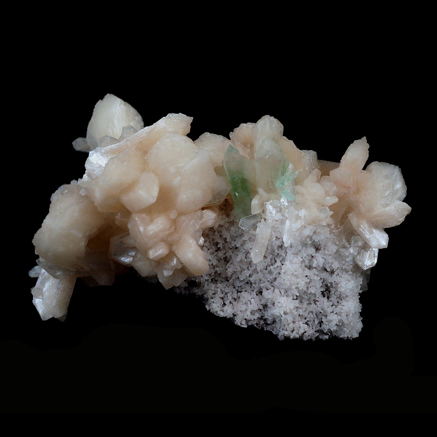 Green Apophyllite with Stilbite on Chalcedony Natural Mineral Specimen… https://www.superbminerals.us/products/green-apophyllite-with-stilbite-on-chalcedony-natural-mineral-specimen-b-4117 Features:The specimen consists of striking, strongly lustrous, transparent and gem, rich green Apophyllite crystals growing in a beautiful spray. The quality of the Apophyllite is tremendous - transparent, limpid, perfect sharp pyramidal terminations and water clear. Small Stilbite crystals are seen too.