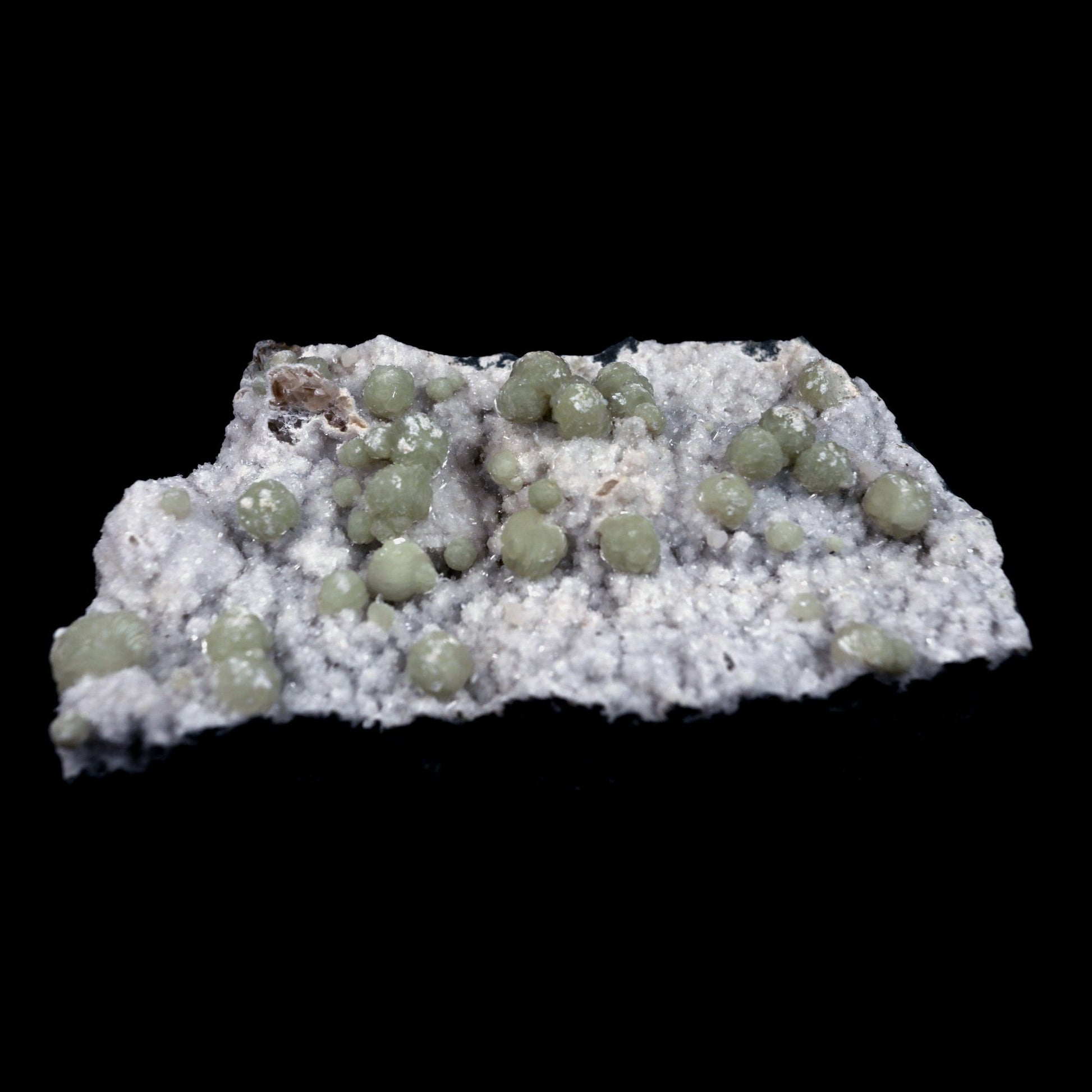 Gyrolite Balls on Chalcedony Natural Mineral Specimen # B 4898  https://www.superbminerals.us/products/gyrolite-balls-on-chalcedony-natural-mineral-specimen-b-4898  Features: Magnificent gyrolite balls scattered throughout a chalcedony matrix.extremely interesting item to have in one's collection Primary Mineral(s): GyroliteSecondary Mineral(s): N/AMatrix: Chalcedony