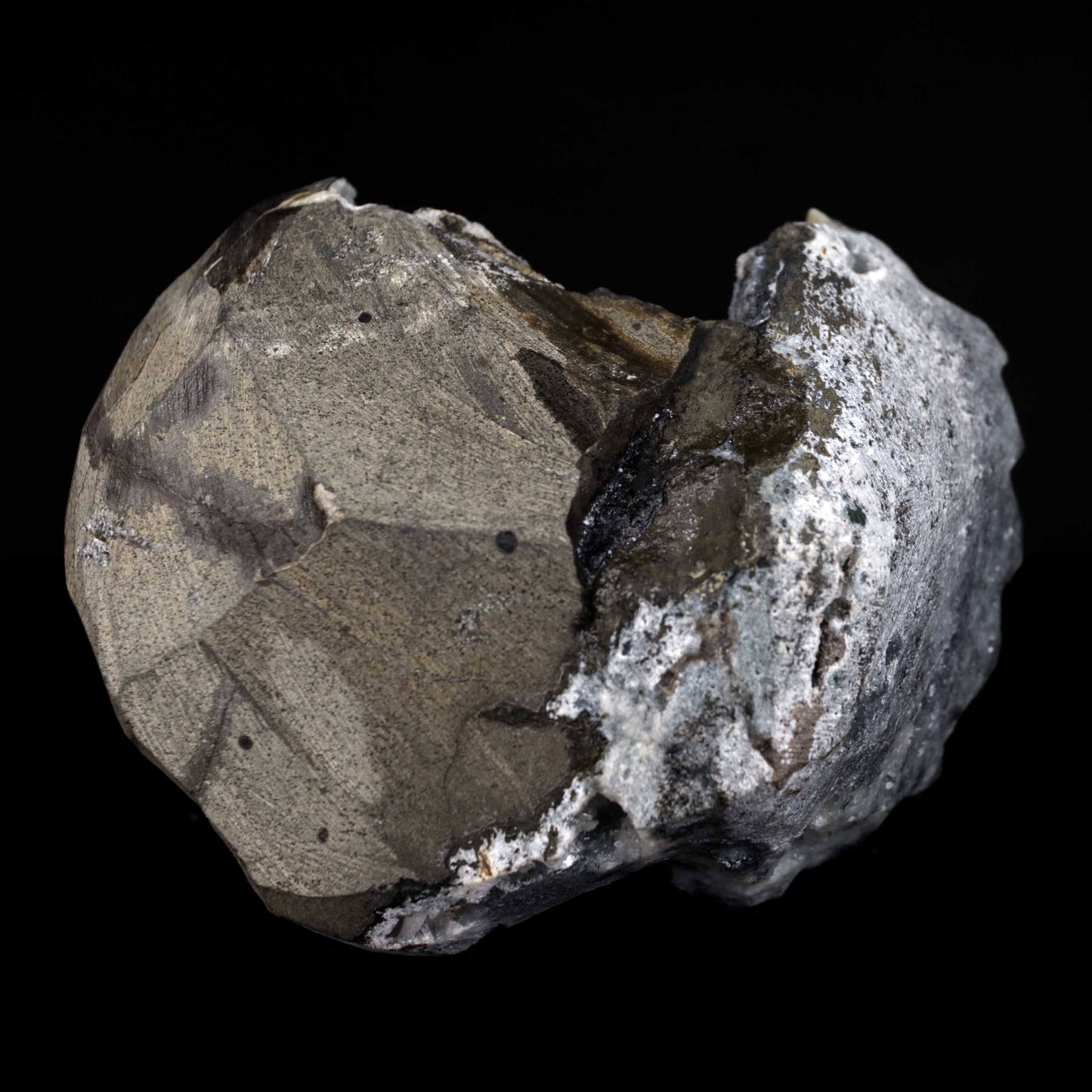 Heulandite Crystal Inside Black Chalcedony Geode Natural Mineral Speci… https://www.superbminerals.us/products/heulandite-crystal-inside-black-chalcedony-geode-natural-mineral-specimen-b-4491 Features:A stunning wedge heulandite crystal is forcefully placed in a sculptural, well-prepared basalt vug bordered with a sharply contrasting sparkling grey drusy chalcedony.The magnificent glassy, iridescent, transparent parallel-growth bladed heulandite has a lovely rich coral-pink hue with unique curving