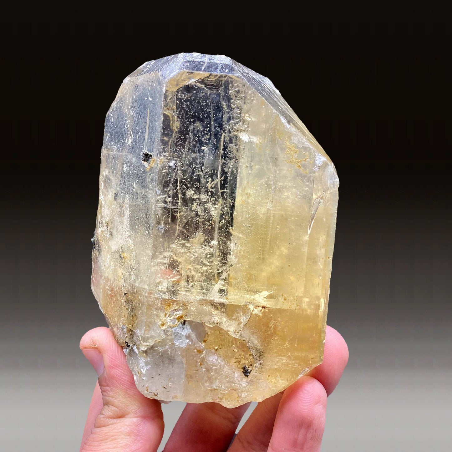 Imperial Topaz # Q7  https://www.superbminerals.us/products/imperial-topaz-q7  Features:Superb 9 Cm crystal of Topaz from this less common locality - Southern India. Imperial Topaz with rich color, clear and gem. It has vivid sherry-orange color. The crystal is strongly lustrous and glassy. It is perfectly terminated with like faceted faces. In superb condition. Splendid gem!