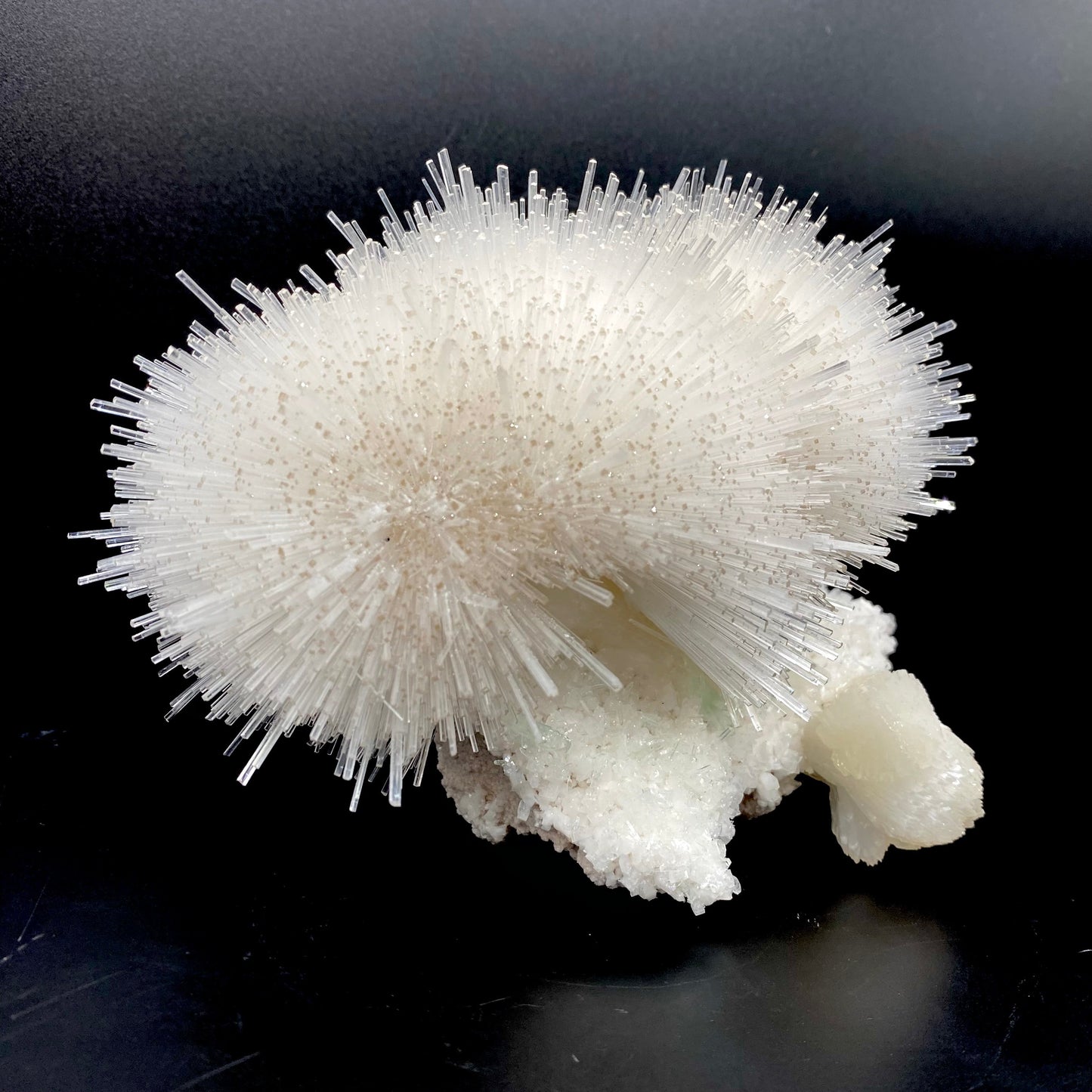 Truly impressive mesolite needles in a gorgeous hemispherical porcupine quill spray, formed with stilbite and green apophyllite on a mordenite matrix. Very delicate museum-grade specimen.