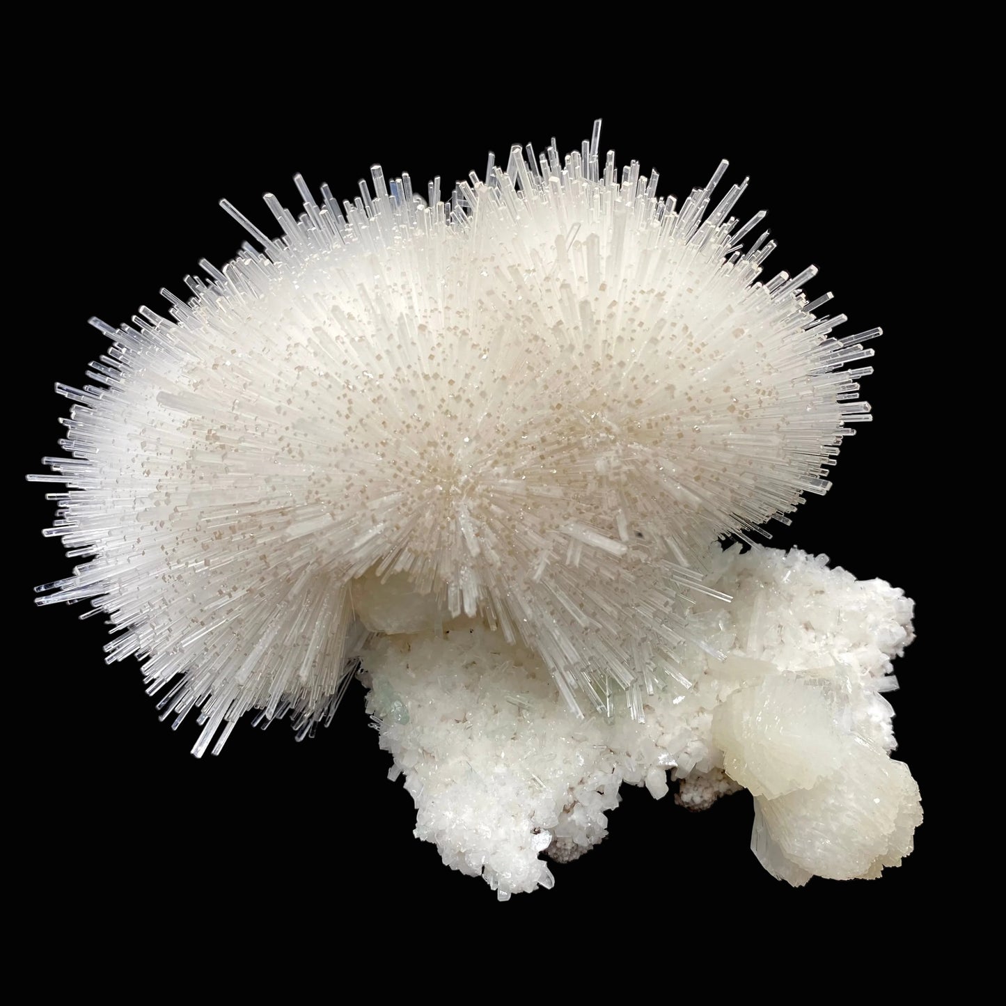 Truly impressive mesolite needles in a gorgeous hemispherical porcupine quill spray, formed with stilbite and green apophyllite on a mordenite matrix. Very delicate museum-grade specimen.
