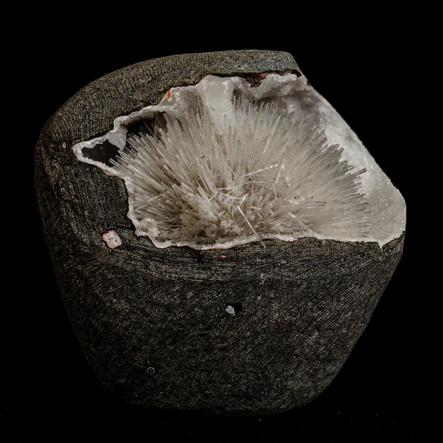 Mesolite Sphere Sprays Inside MM Quartz Geode Natural Mineral Specimen… https://www.superbminerals.us/products/mesolite-sphere-sprays-inside-mm-quartz-geode-natural-mineral-specimen-b-5063 Features: An impressive and very rich large hemispherical porcupine quill spray of glassy mesolite needles is aesthetically set inside geode of MM Quartz basalt matrix covered with contrasting frosted, tetragonal, mint-green apophyllite crystals on this very fine combination from the well-known quarries of the Pune