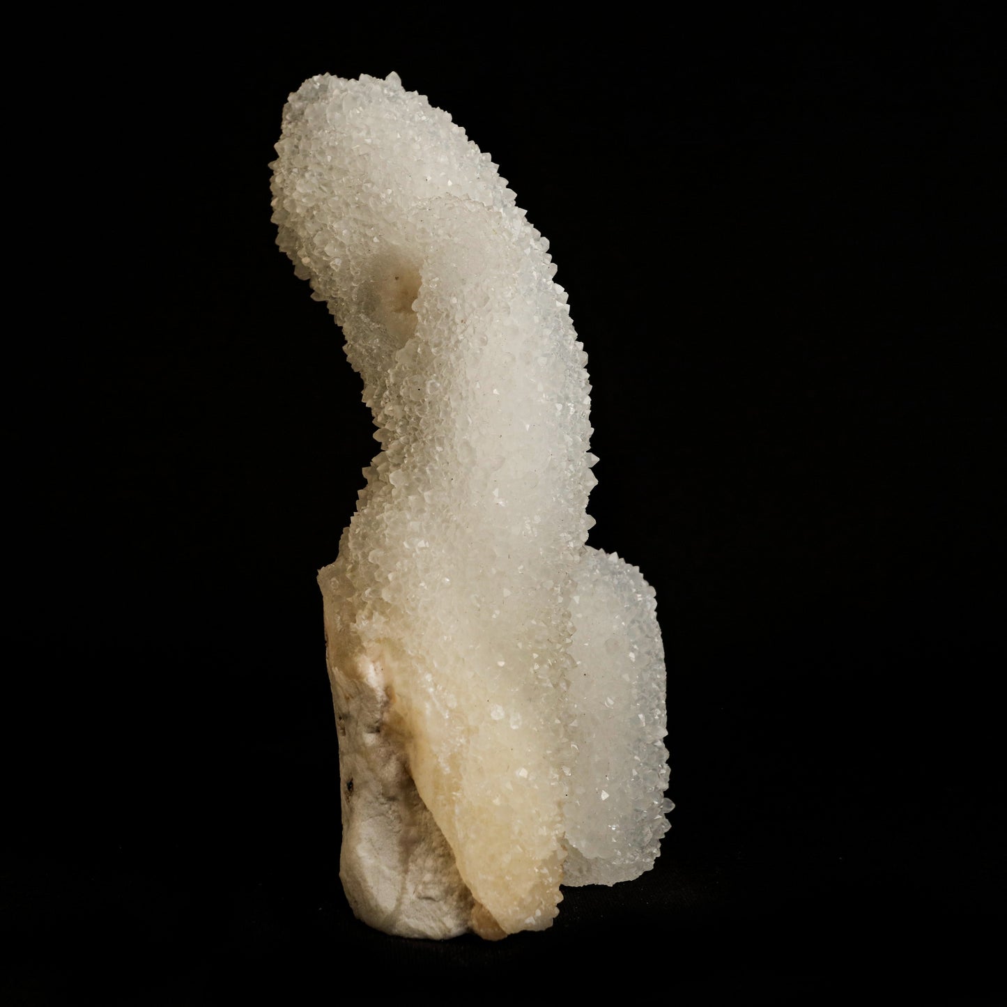 MM Quartz Stalactites Natural Mineral Specimen # B 5041 https://www.superbminerals.us/products/mm-quartz-stalactites-natural-mineral-specimen-b-5041 Features: A very aesthetic specimen of transparent clear Quartz crystals completely covering all sides of a 6inch high stalactite as well as two smaller adjoining stalactites, making for great symmetry. A beautiful showy piece in excellent condition. Primary Mineral(s): QuartzSecondary Mineral(s): N/A