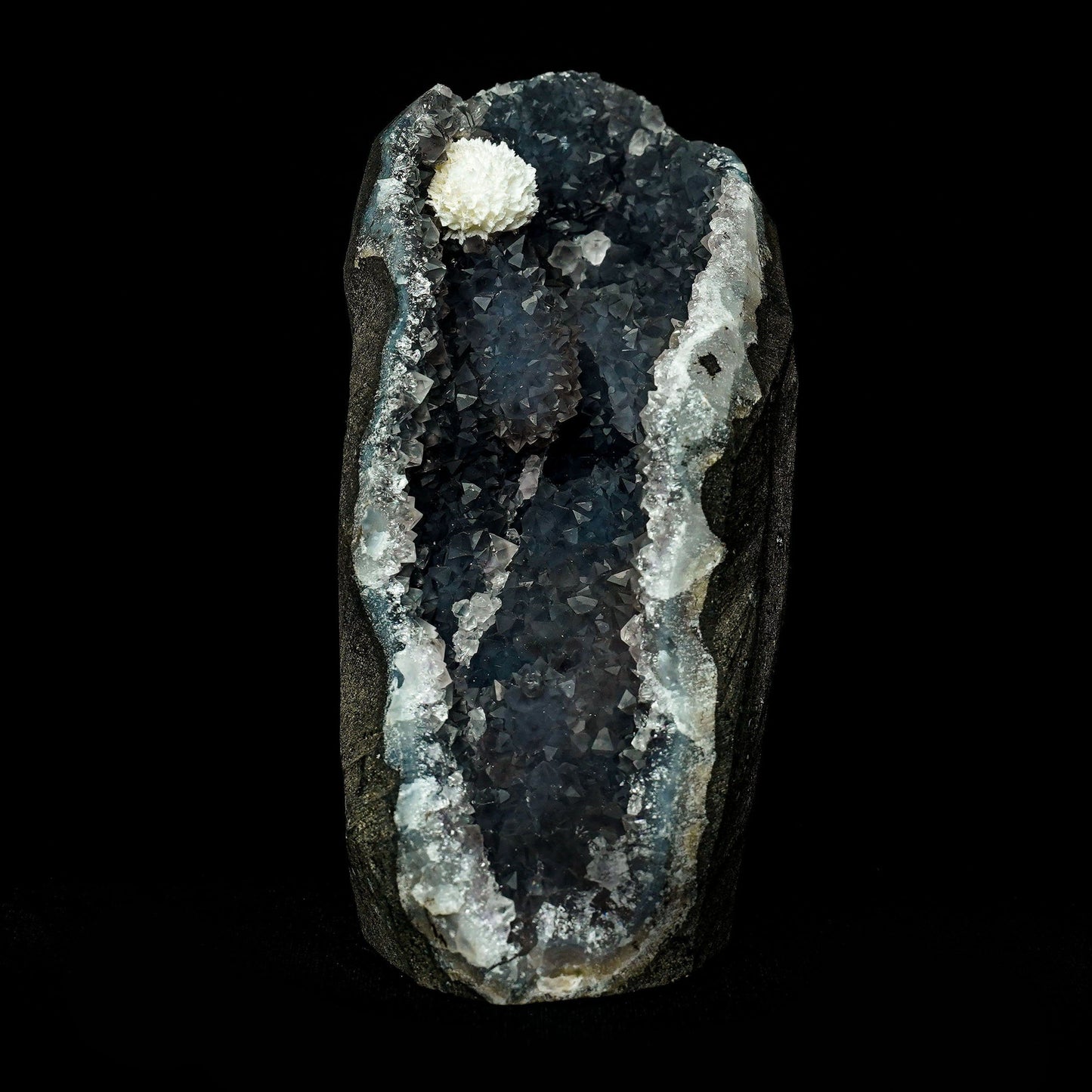 Mordenite Ball At Top MM Quartz Geode Natural Mineral Specimen # B 49… https://www.superbminerals.us/products/mordenite-ball-at-top-mm-quartz-geode-natural-mineral-specimen-b-4949 Features:Mordenite ball crystals are nicely distributed across the MM Quartz pocket, giving the specimen fine balance to go along with the beautiful contrast in color. The Mordenites are well-defined,