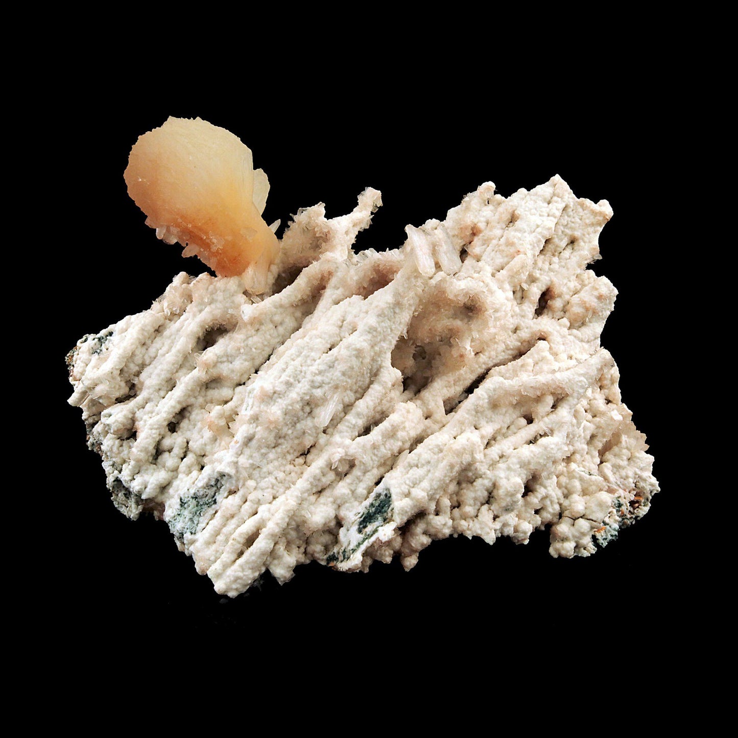 Pink Stilbite Crystal on Chalcedony Natural Coral Formation # B 2603 his is an intergrown group of lustrous, translucent, terra-cotta colored Stilbite on Chalcedony natural coral formation. Primary Mineral(s): Stilbite Secondary Mineral(s): N/AMatrix: Chalcedony19 cm x 14 cm750 GmsLocality: Aurangabad, Maharashtra, IndiaYear of Discovery: 2018