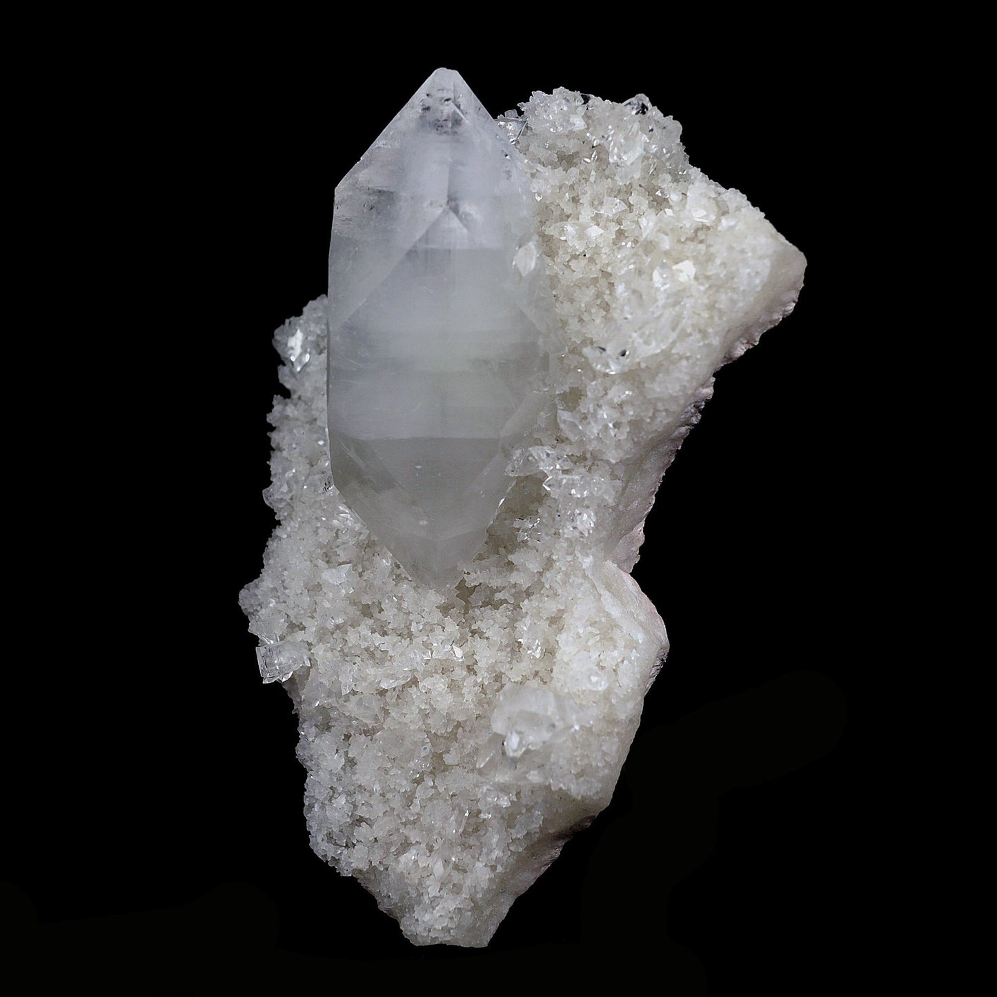 Pointed Apophyllite Crystal on Chalcedony Natural Mineral Specimen # B… https://www.superbminerals.us/products/pointed-apophyllite-crystal-on-chalcedony-natural-mineral-specimen-b-4120 Features:One big intersecting doubly-terminated crystal of colorless Apophyllite perched on small plate of white chalcedony Microcrystals. The tip of the smaller crystal is cleaved with a clean surface. Primary Mineral(s): ApophylliteSecondary Mineral(s): StilbiteMatrix: N/A10 cm x 6 cm 150 GmsLocality: Jalgaon