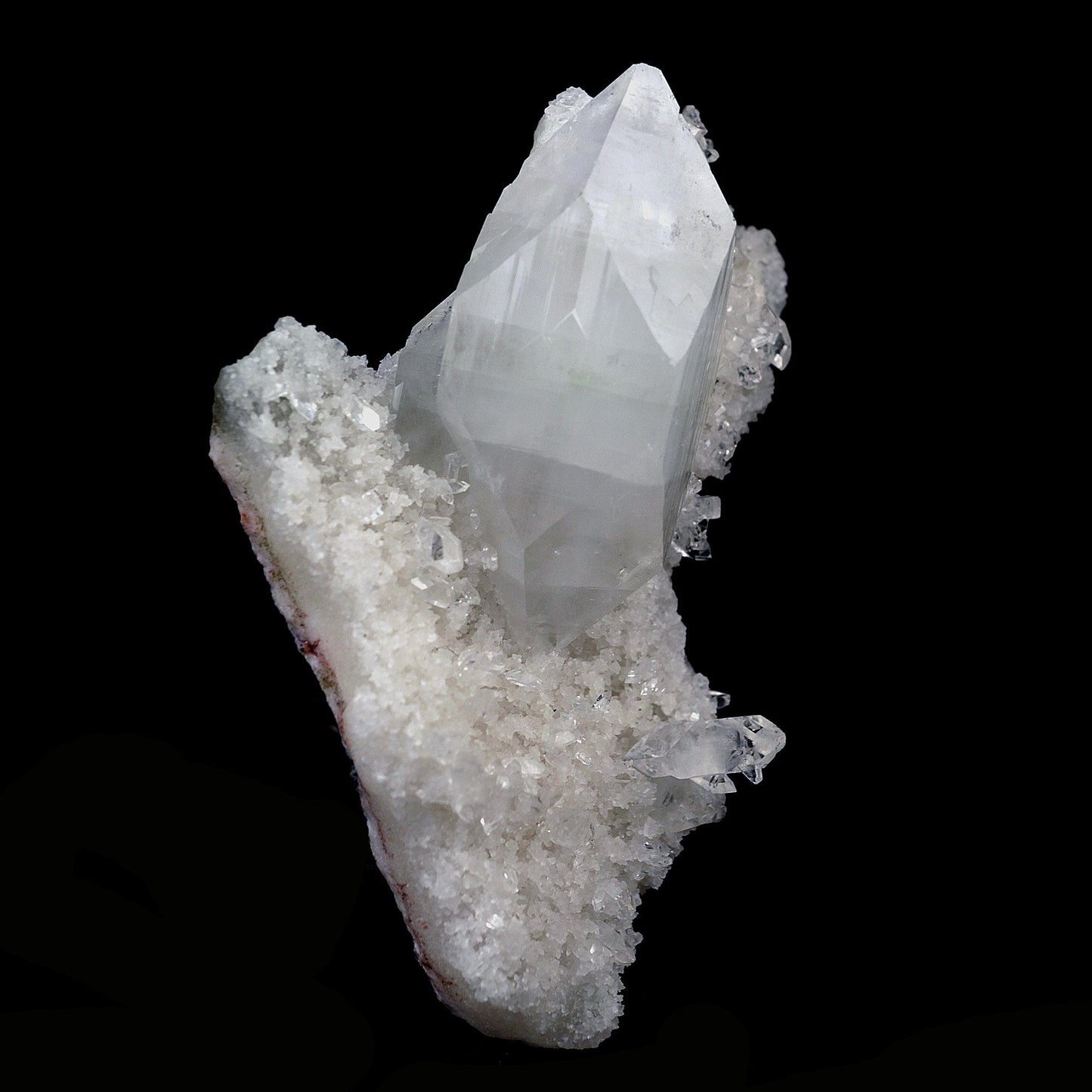 Pointed Apophyllite Crystal on Chalcedony Natural Mineral Specimen # B… https://www.superbminerals.us/products/pointed-apophyllite-crystal-on-chalcedony-natural-mineral-specimen-b-4120 Features:One big intersecting doubly-terminated crystal of colorless Apophyllite perched on small plate of white chalcedony Microcrystals. The tip of the smaller crystal is cleaved with a clean surface. Primary Mineral(s): ApophylliteSecondary Mineral(s): StilbiteMatrix: N/A10 cm x 6 cm 150 GmsLocality: Jalgaon