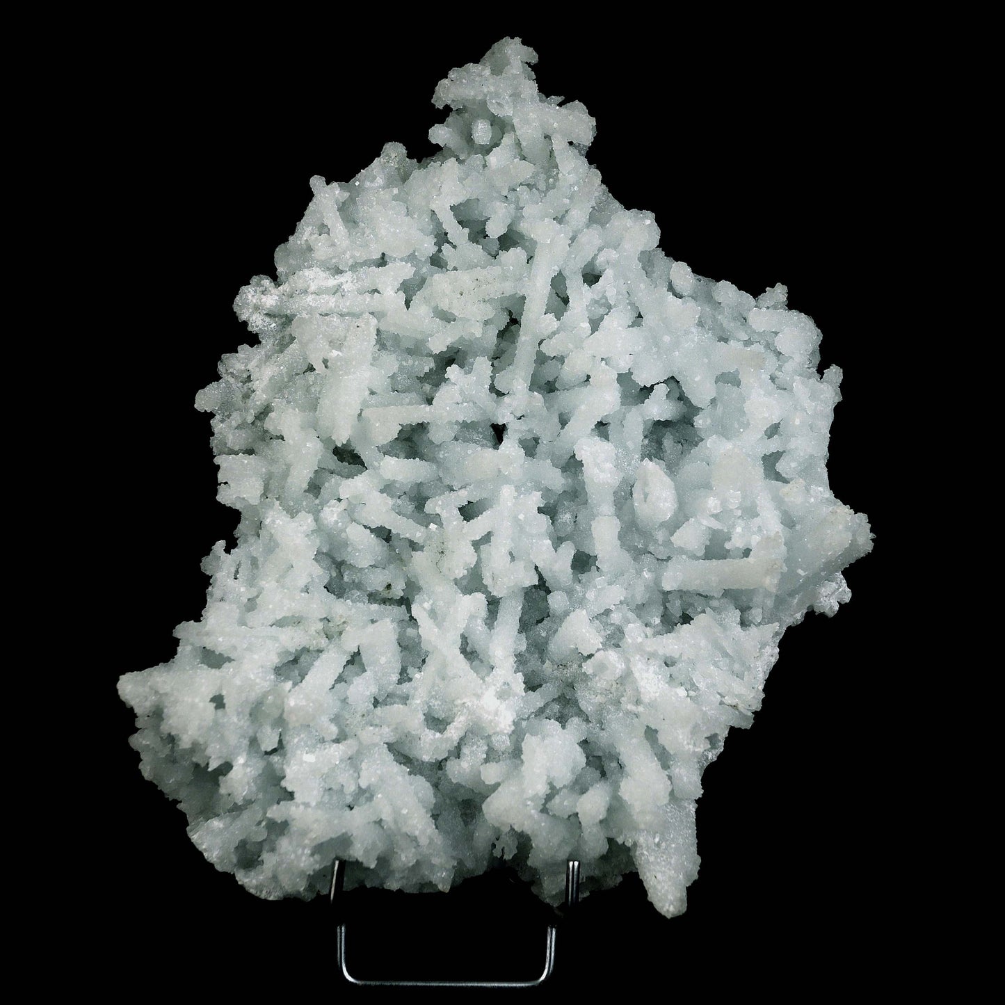 Prehnite Natural Mineral Specimen # B 4596 https://www.superbminerals.us/products/prehnite-natural-mineral-specimen-b-4596 Features:Precious jackstraw cluster of elongated laumontite crystals that pseudomorphed from mint-green, translucent prehnite crystals.Malad Quarry in Mumbai is well-known for its classic and exceptional vintage material.The quarry's closure. Primary Mineral(s): Prehnite
