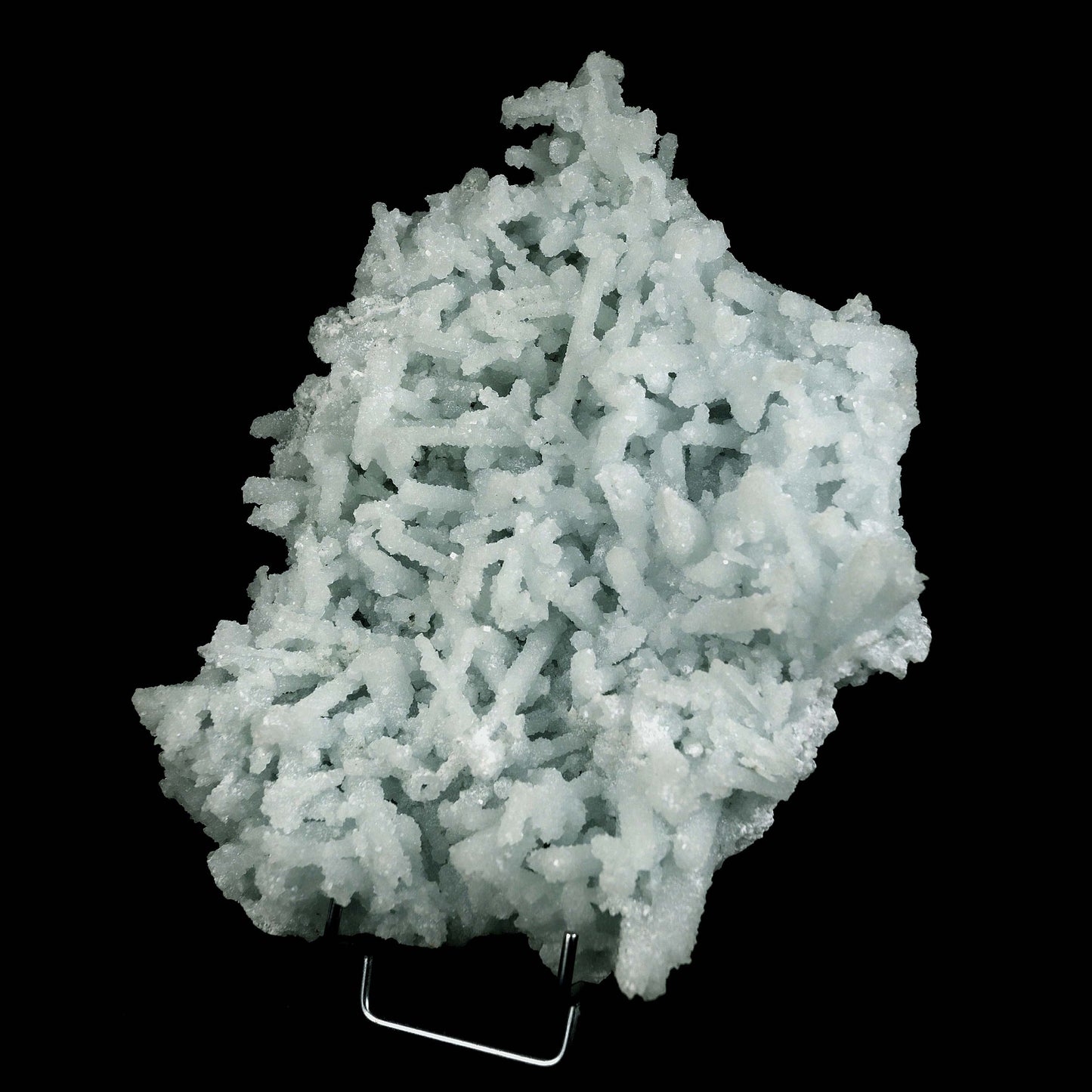 Prehnite Natural Mineral Specimen # B 4596 https://www.superbminerals.us/products/prehnite-natural-mineral-specimen-b-4596 Features:Precious jackstraw cluster of elongated laumontite crystals that pseudomorphed from mint-green, translucent prehnite crystals.Malad Quarry in Mumbai is well-known for its classic and exceptional vintage material.The quarry's closure. Primary Mineral(s): Prehnite
