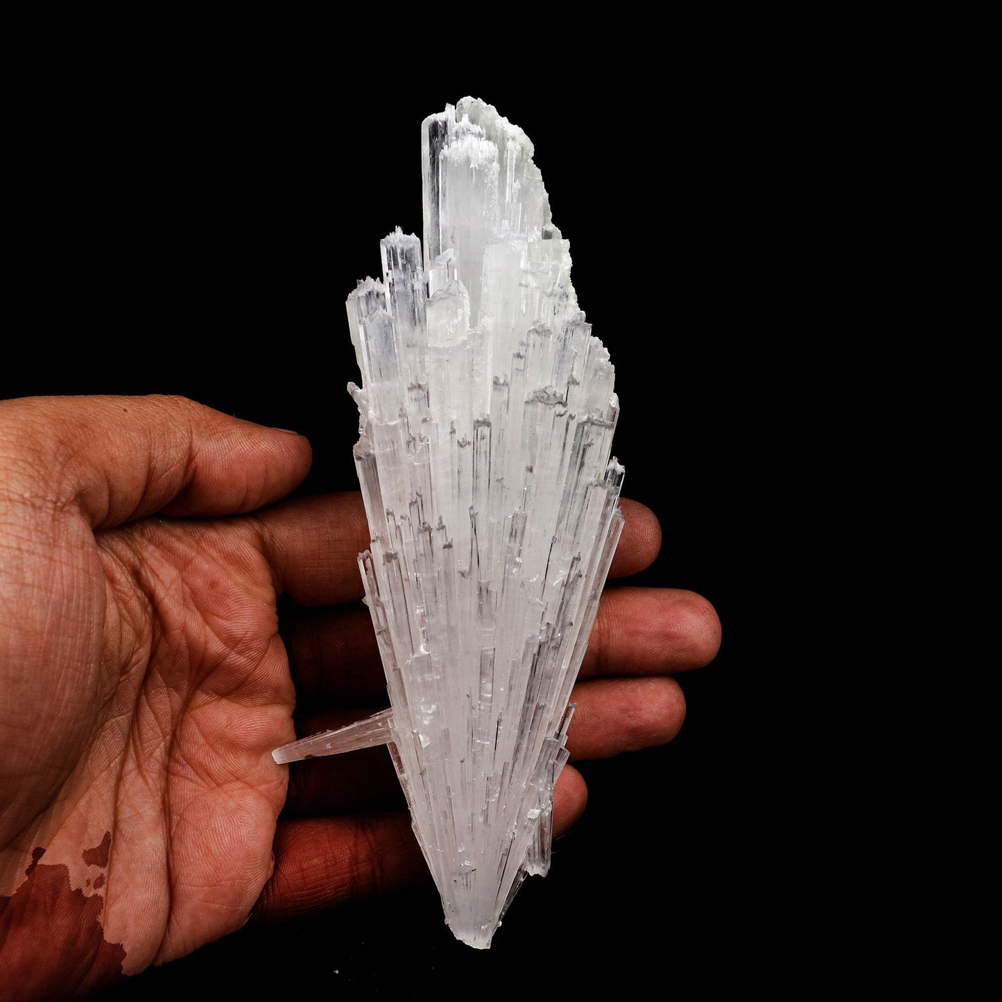 Scolecite Accular Spray Natural Mineral Specimen # B 5279  https://www.superbminerals.us/products/scolecite-accular-spray-natural-mineral-specimen-b-5279  Features: This specimen features a large, radial formation of colorless, transparent, lustrous acicular Scolecite crystals on peach-colored Stilbite. Primary Mineral(s): Scolecite Secondary Mineral(s): N/AMatrix: N/A 6 Inch x 2.5 InchWeight : 145 GmsLocality: Aurangabad, Maharashtra, India Year of Discovery: 2021