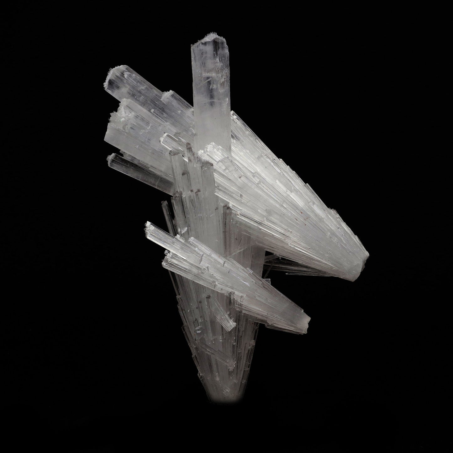 Scolecite Spray Cross Formation Natural Mineral Specimen # B 5202 https://www.superbminerals.us/products/scolecite-spray-cross-formation-natural-mineral-specimen-b-5202 Features: Scolecite forms in clusters of sharp, prismatic, “needle-like” points, which often radiate outward from a source, or, alternatively, criss-cross with each other to form sculptures that are truly a natural art form. Scolecite is mainly found in India, although there are also deposits of white scolecite