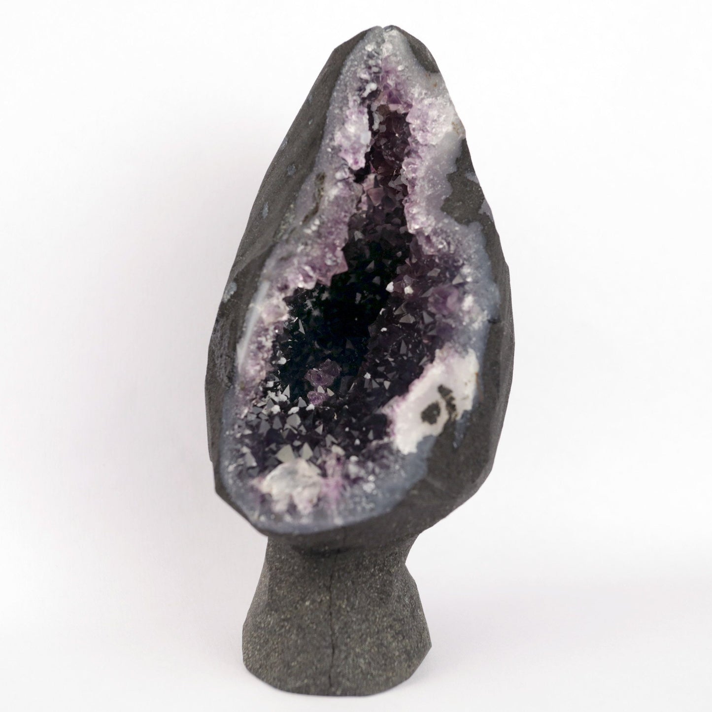 Sparkling Amethyst Geode Natural Mineral Specimen # B 4710 https://www.superbminerals.us/products/sparkling-amethyst-geode-natural-mineral-specimen-b-4710 Features: A very large plate of lustrous, large deep-purple Amethyst crystals with two clusters (one large and one smaller) of highly translucent, colorless, intergrown parallel “nailhead spar” crystals emanating from the center of the plate of Amethyst. It is incredible! Amazing color, luster, symmetry