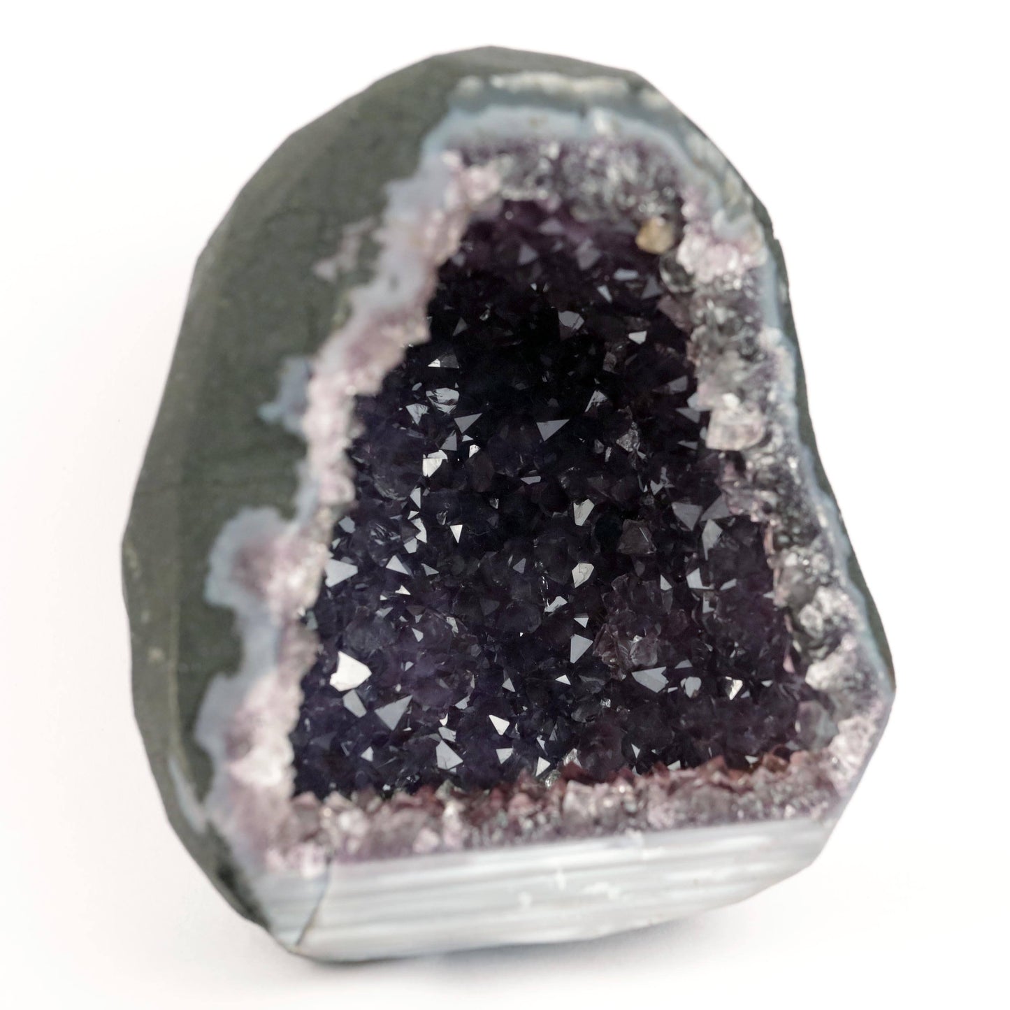 Sparkling Purple Amethyst Geode Natural Mineral Specimen # B 4636 https://www.superbminerals.us/products/sparkling-purple-amethyst-geode-natural-mineral-specimen-b-4636 Features: Large Amethyst Cluster with rich purple gems. Stunning Amethyst has a vibrant, rich hue and a brilliant sparkle. Besides its colour and brilliance, I chose this piece for its unusual and asymmetrical form. In a sea of identical-looking geodes, it stood out. I would recommend this as a decorative item.