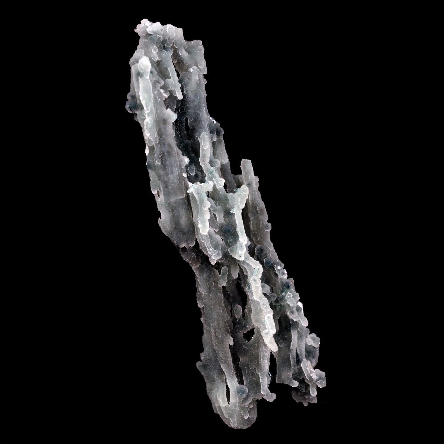 Stilbite on Chalcedony Coral Natural Mineral Specimen # B 4827 https://www.superbminerals.us/products/stilbite-on-chalcedony-coral-natural-mineral-specimen-b-4827 Features: Stalactites of drusy greenish-gray chalcedony dangle from a stunning corsage of iridescent, salmon-pink stilbite bowties. The matrix is highly sculptural.With only a few touched stalactite tips, this piece is essentially flawless and looks great from all angles!Outstanding huge Jalgaon combo