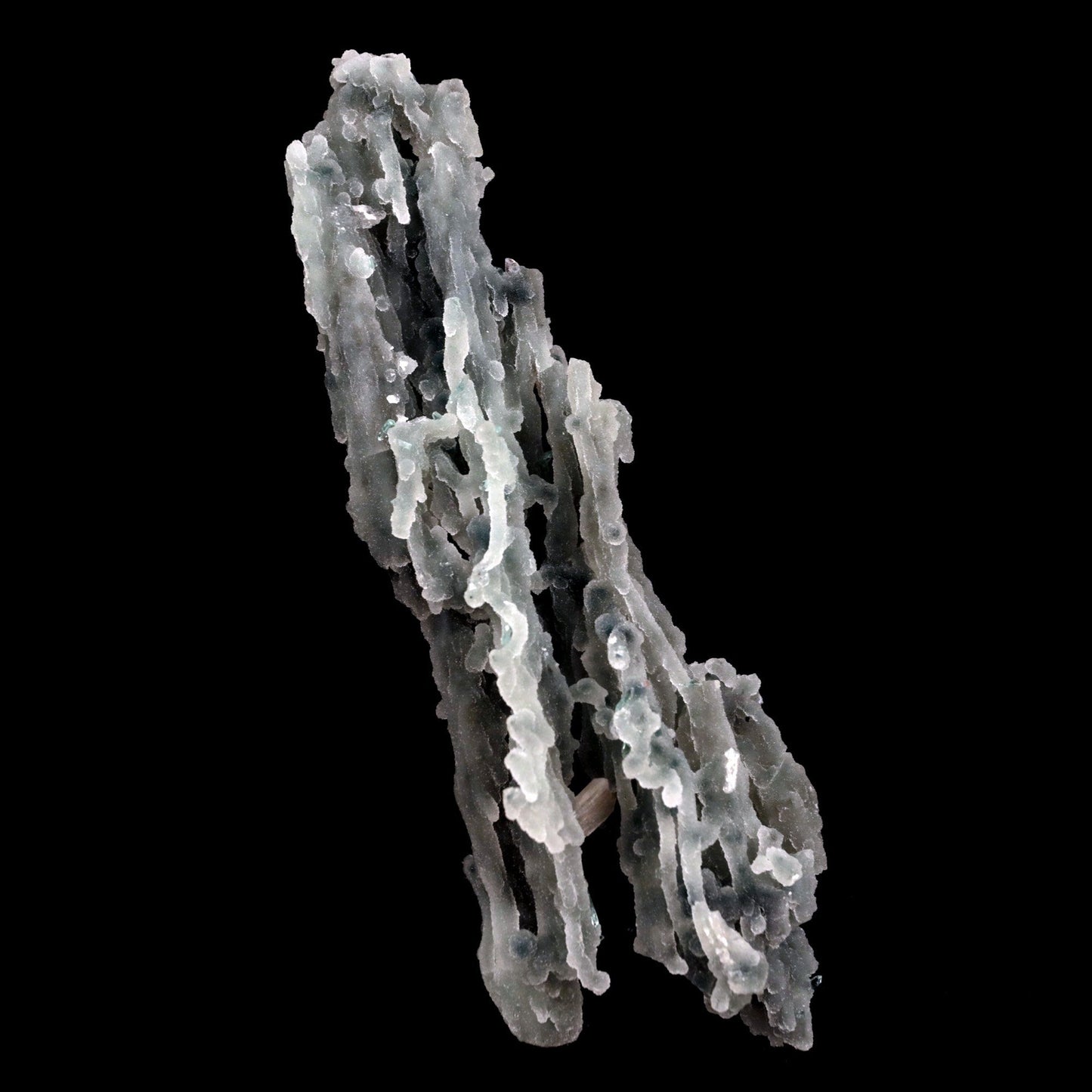 Stilbite on Chalcedony Coral Natural Mineral Specimen # B 4827 https://www.superbminerals.us/products/stilbite-on-chalcedony-coral-natural-mineral-specimen-b-4827 Features: Stalactites of drusy greenish-gray chalcedony dangle from a stunning corsage of iridescent, salmon-pink stilbite bowties. The matrix is highly sculptural.With only a few touched stalactite tips, this piece is essentially flawless and looks great from all angles!Outstanding huge Jalgaon combo